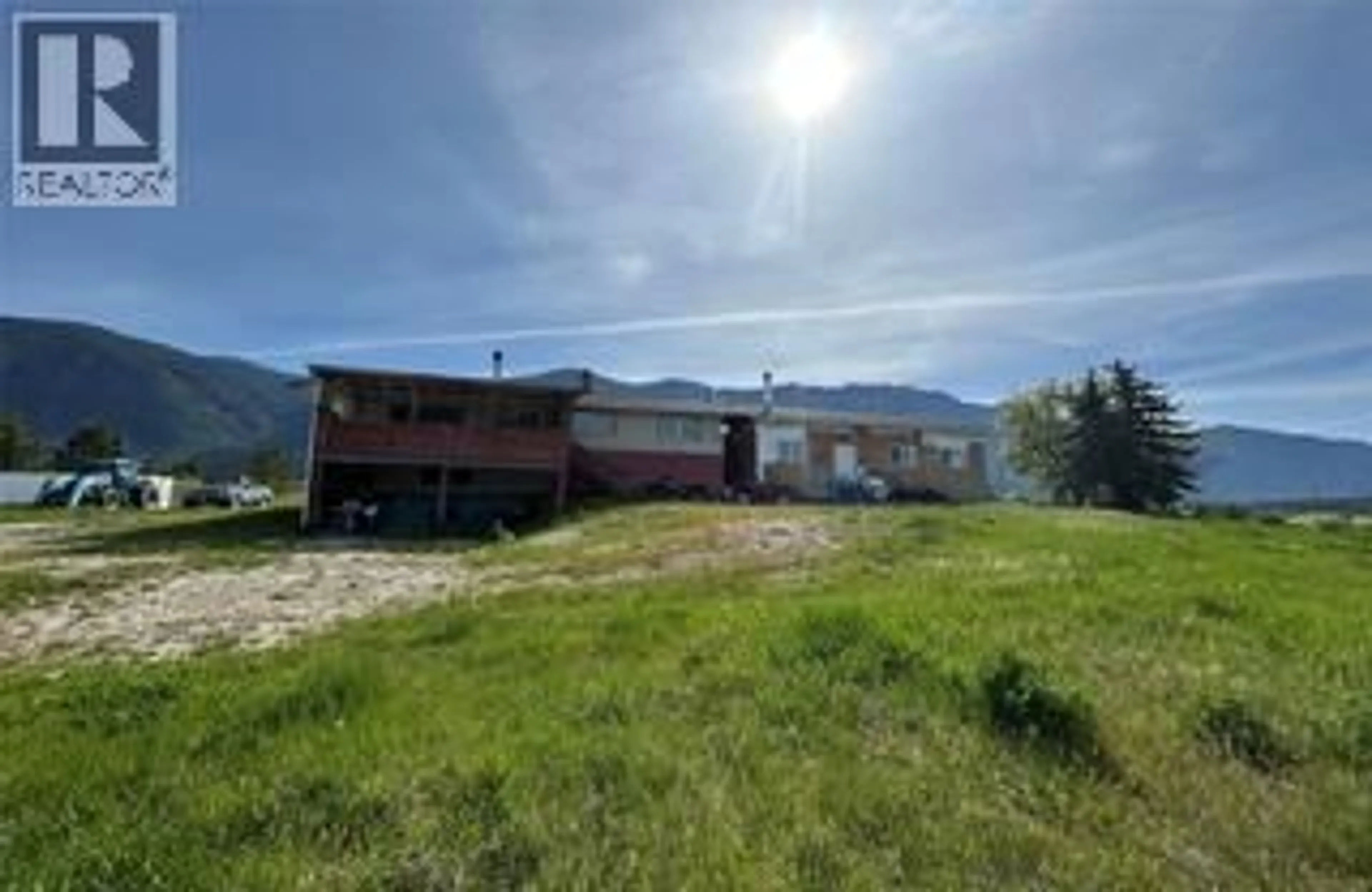 A pic from outside/outdoor area/front of a property/back of a property/a pic from drone, mountain view for 3853 MUZZY ROAD, Creston British Columbia V0B1C1