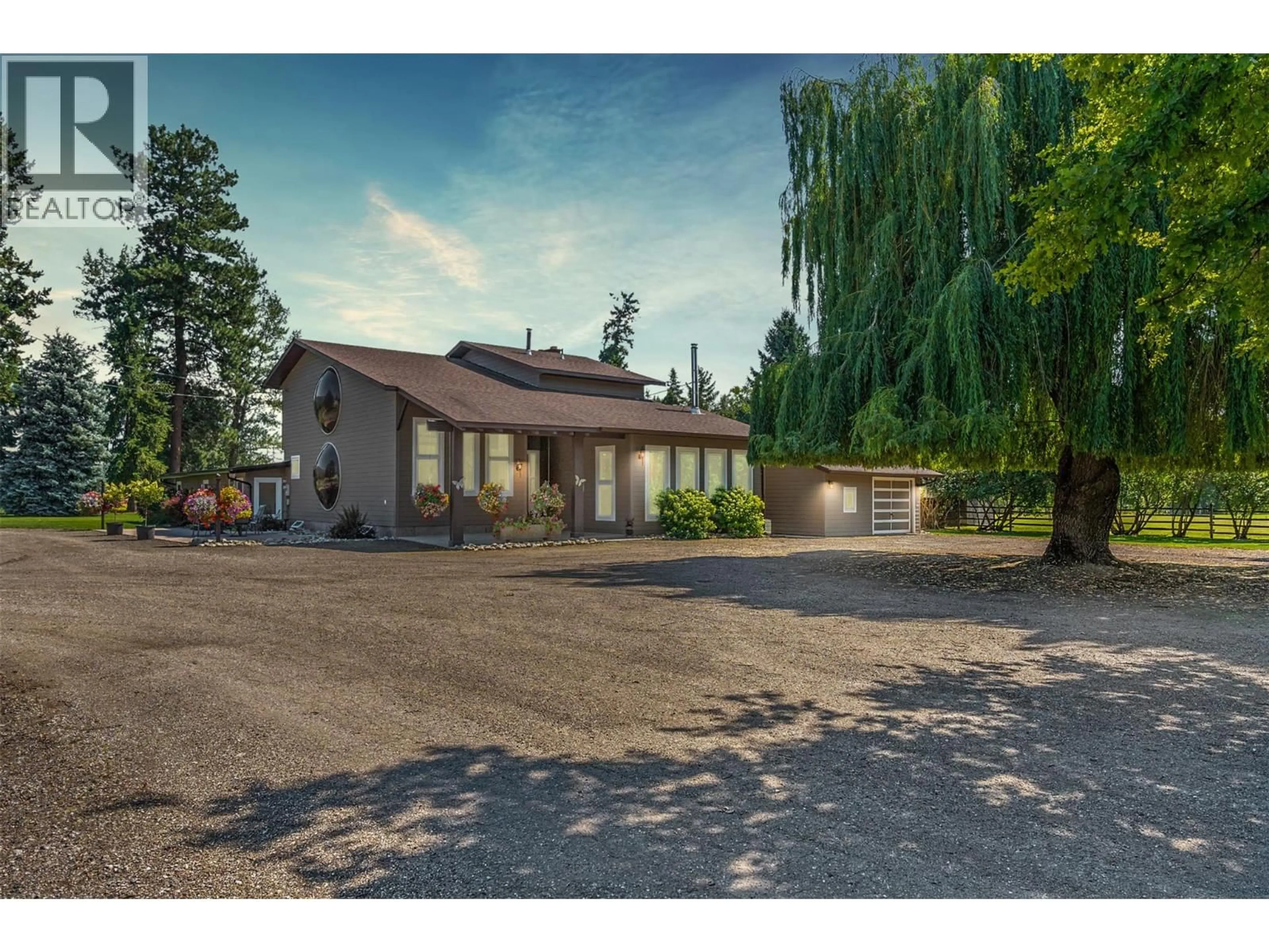 A pic from outside/outdoor area/front of a property/back of a property/a pic from drone, street for 48 WATERSIDE ROAD, Enderby British Columbia V4Y4G5
