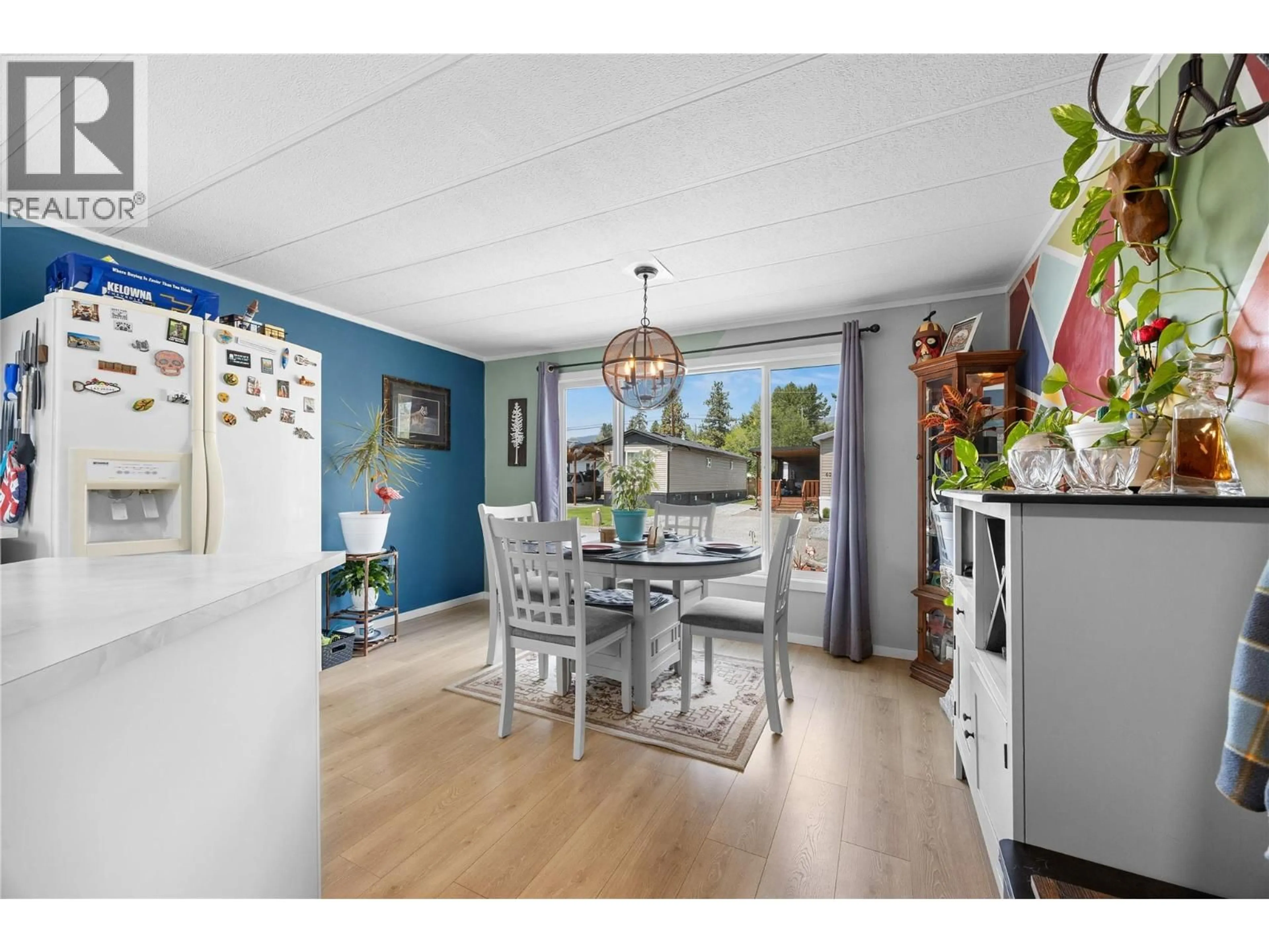Dining room, wood/laminate floor for 59 - 1881 BOUCHERIE ROAD, Westbank British Columbia V4T0C9