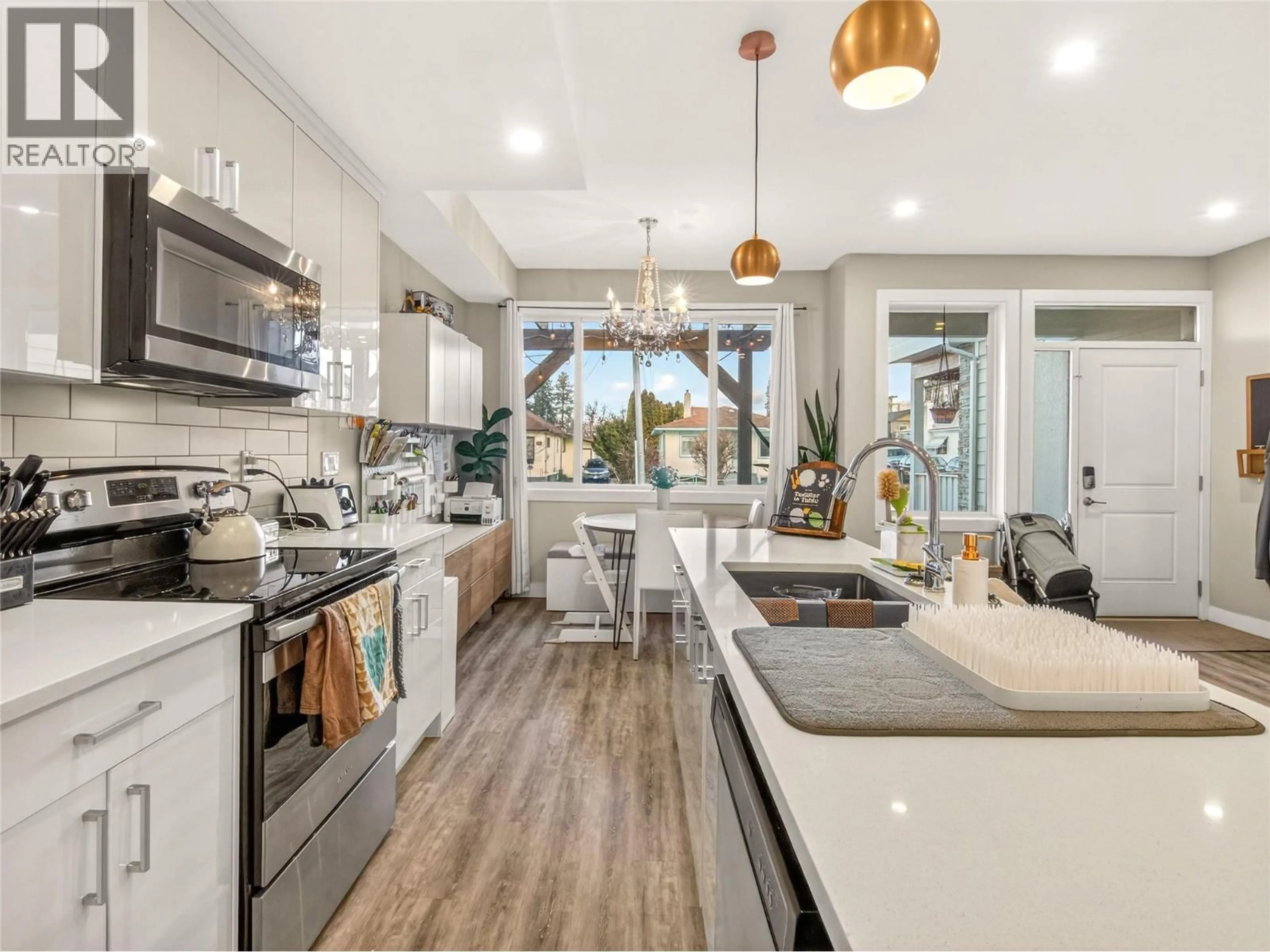 Open concept kitchen, ceramic/tile floor for 103 - 102 COSSAR AVENUE, Penticton British Columbia V2A2V4