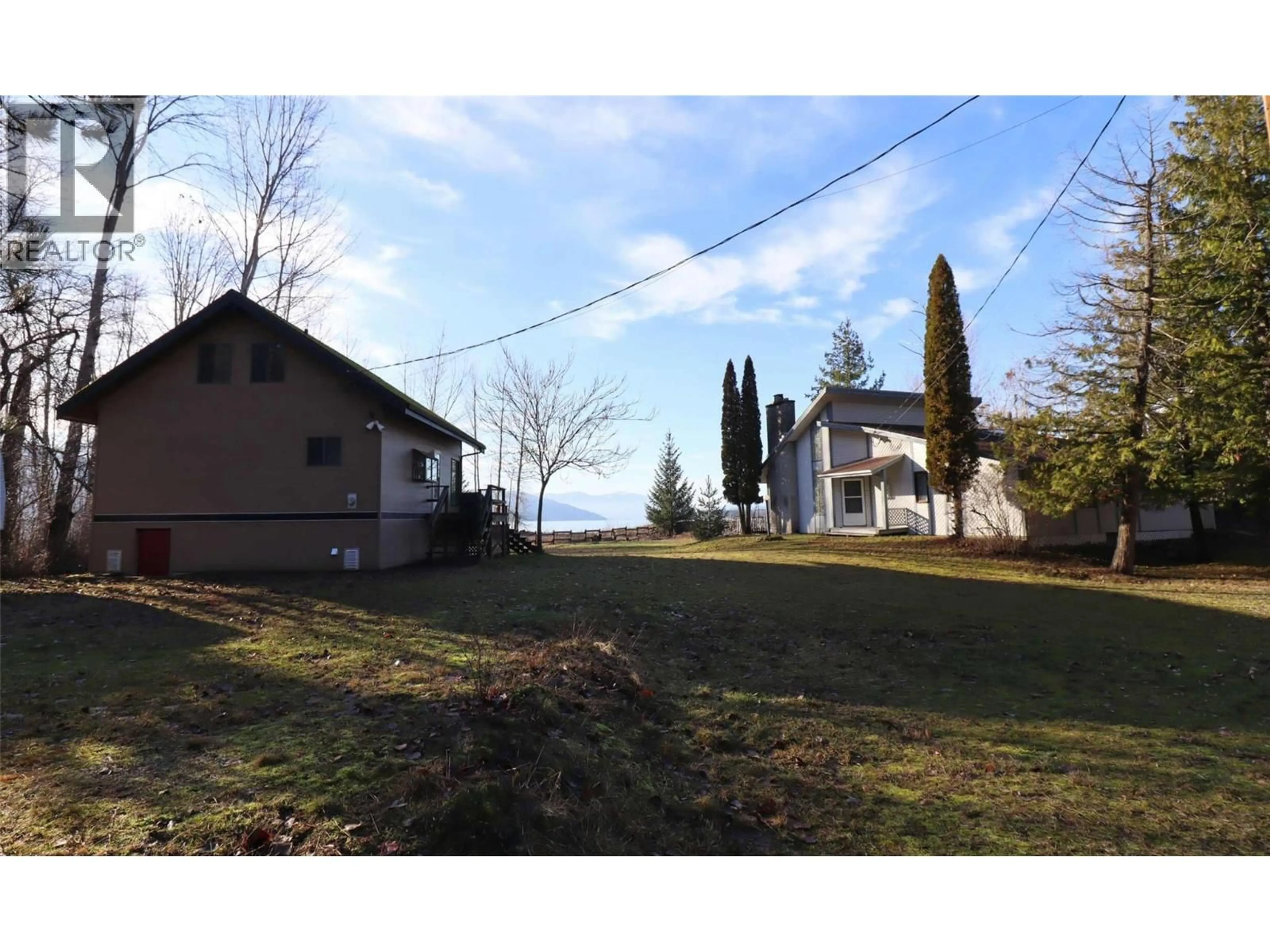 A pic from outside/outdoor area/front of a property/back of a property/a pic from drone, street for 6884 SQUILAX-ANGLEMONT ROAD, Magna Bay British Columbia V0E1M7