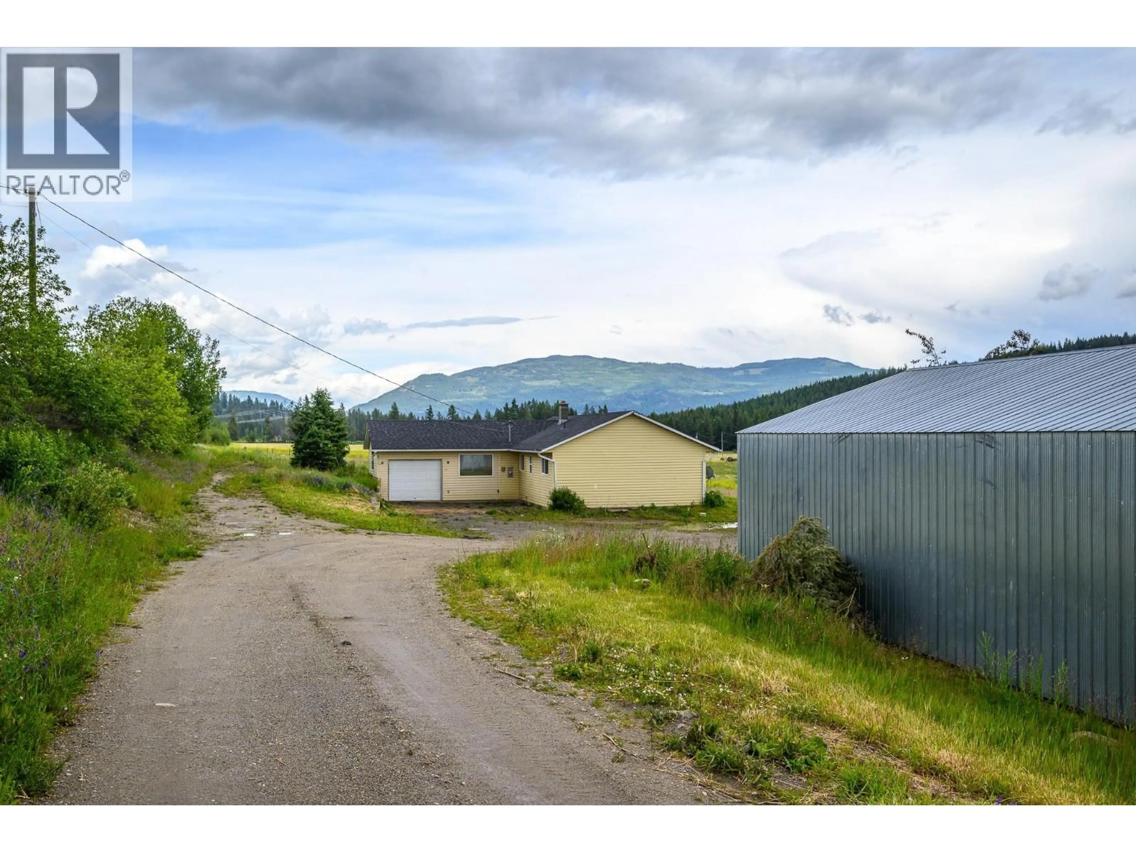 A pic from outside/outdoor area/front of a property/back of a property/a pic from drone, mountain view for 3575 CANYON ROAD, Spallumcheen British Columbia V4Y0M7
