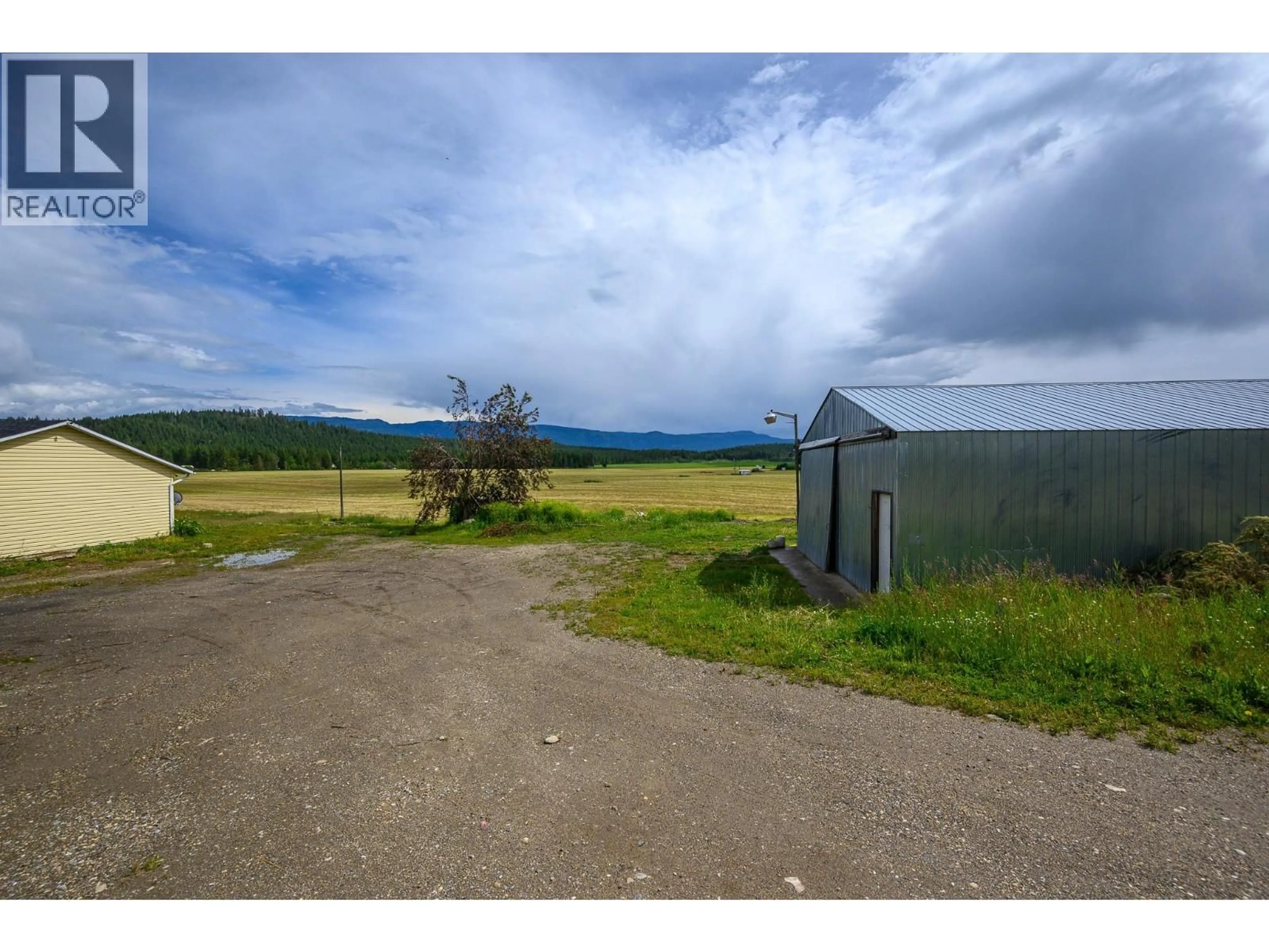 A pic from outside/outdoor area/front of a property/back of a property/a pic from drone, mountain view for 3575 CANYON ROAD, Spallumcheen British Columbia V4Y0M7