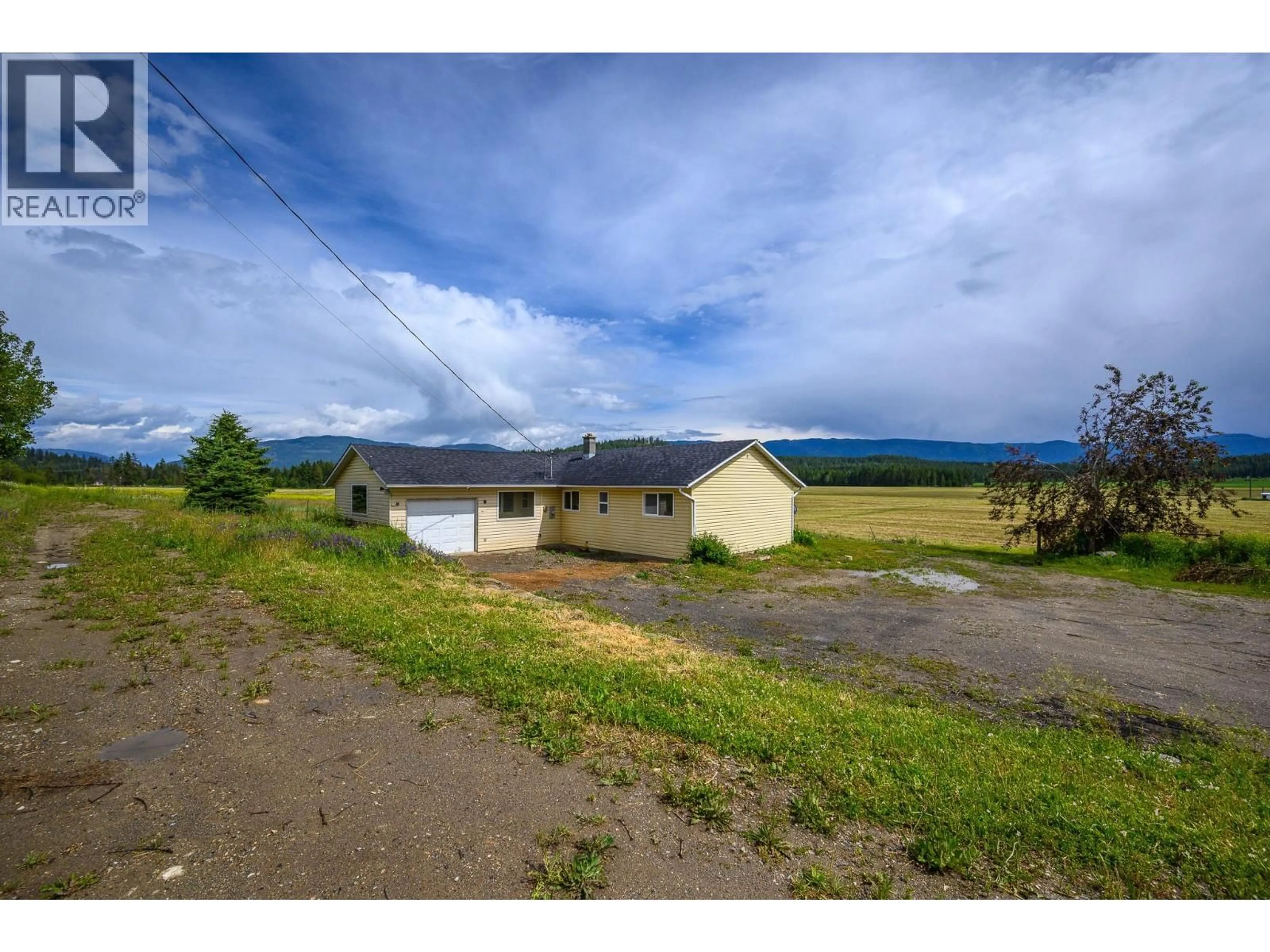 A pic from outside/outdoor area/front of a property/back of a property/a pic from drone, mountain view for 3575 CANYON ROAD, Spallumcheen British Columbia V4Y0M7
