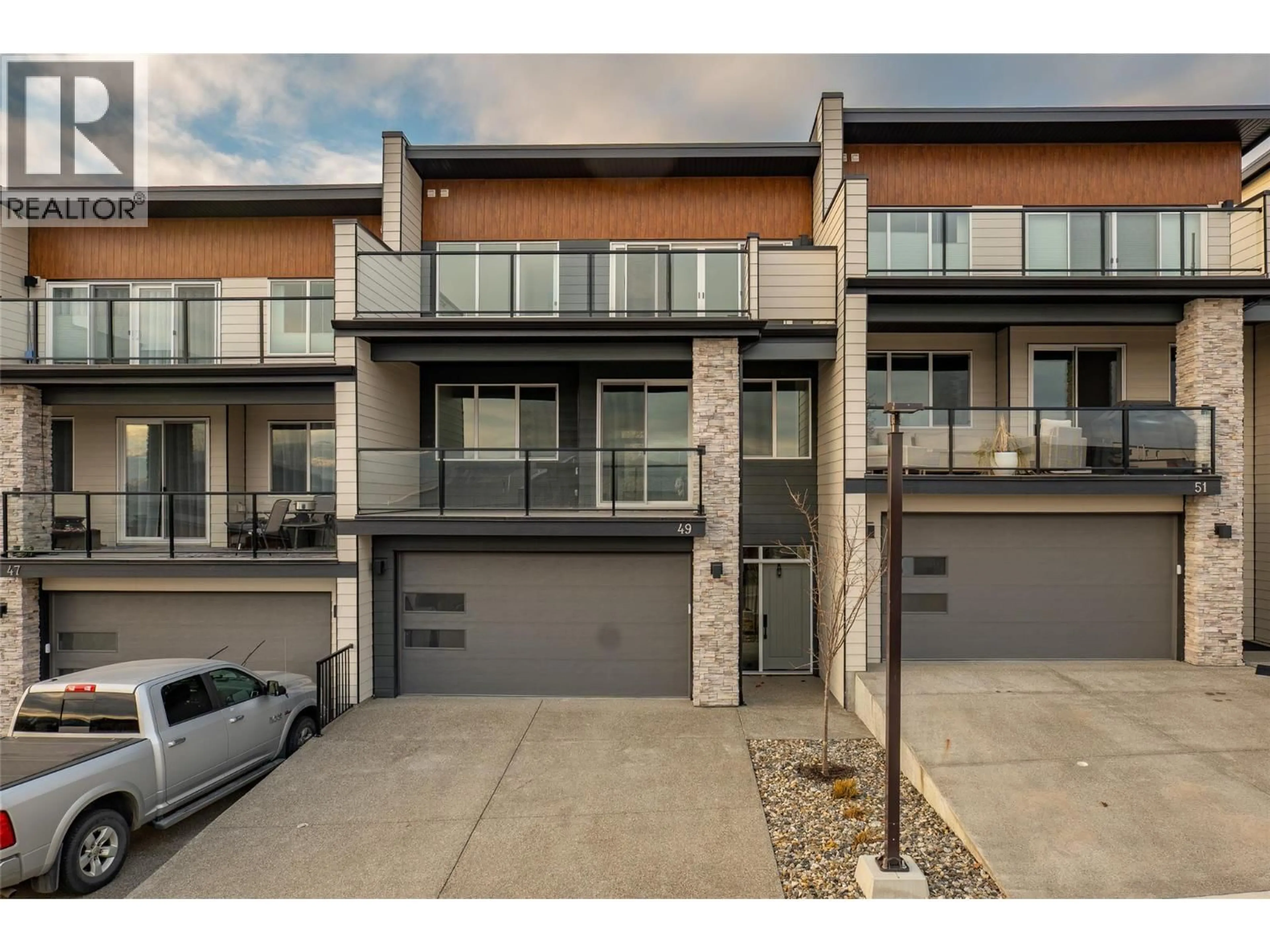 A pic from outside/outdoor area/front of a property/back of a property/a pic from drone, street for 49 - 7735 OKANAGAN HILLS BOULEVARD, Vernon British Columbia V1H0A7