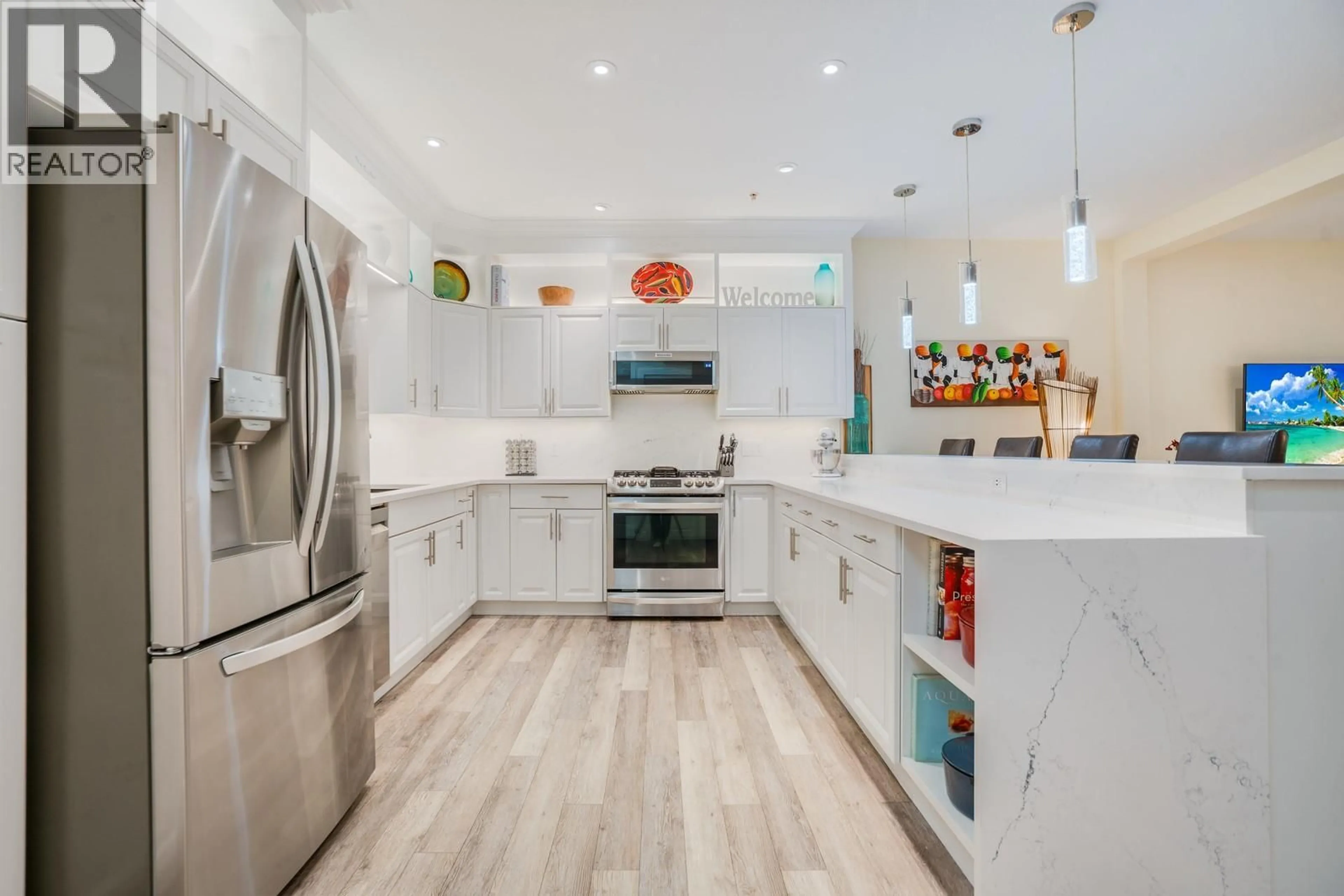 Contemporary kitchen, ceramic/tile floor for 202 - 3996 BEACH AVENUE, Peachland British Columbia V0H1X5