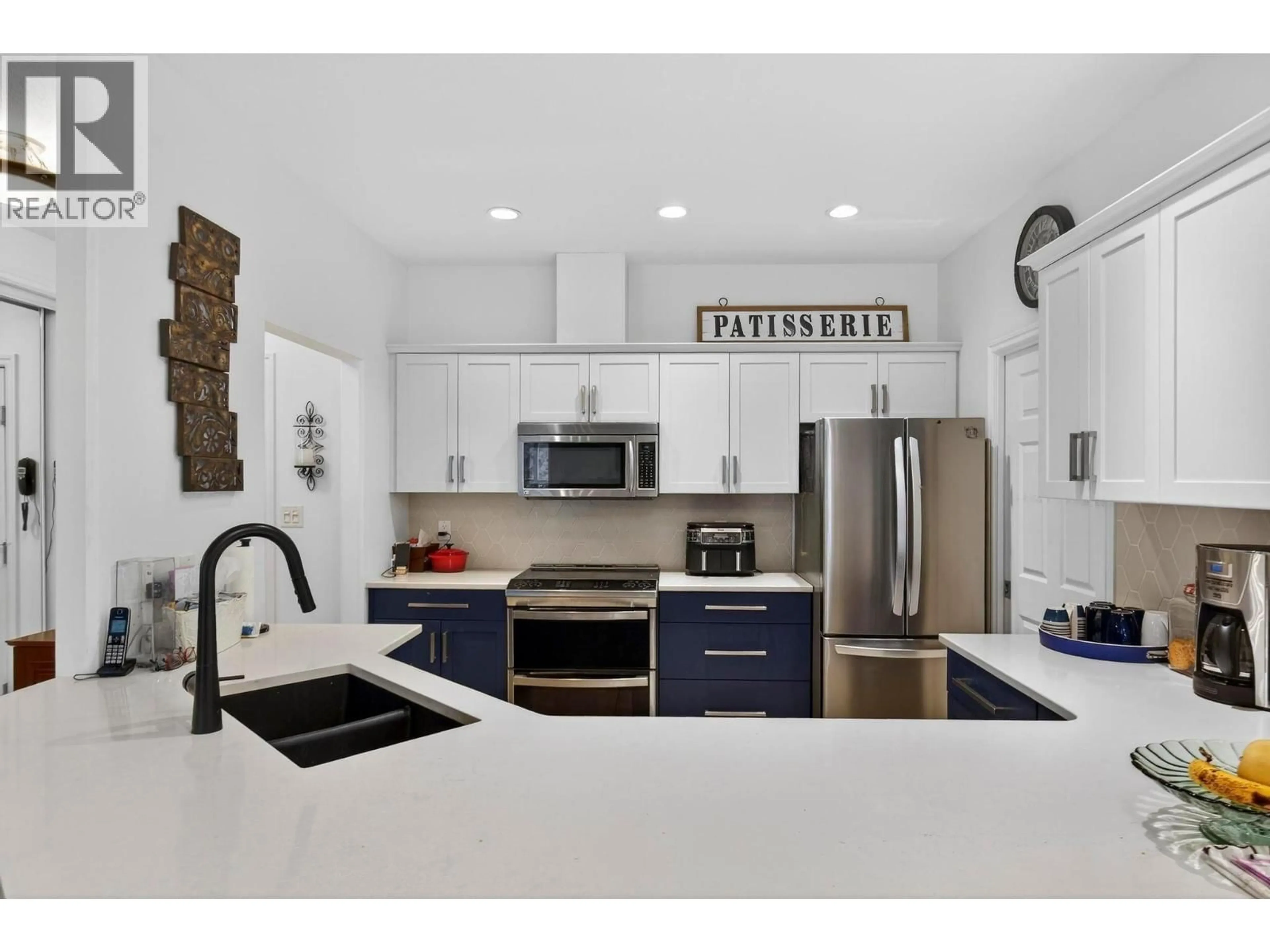 Open concept kitchen, ceramic/tile floor for 211 - 1961 DURNIN ROAD, Kelowna British Columbia V1X7Z6