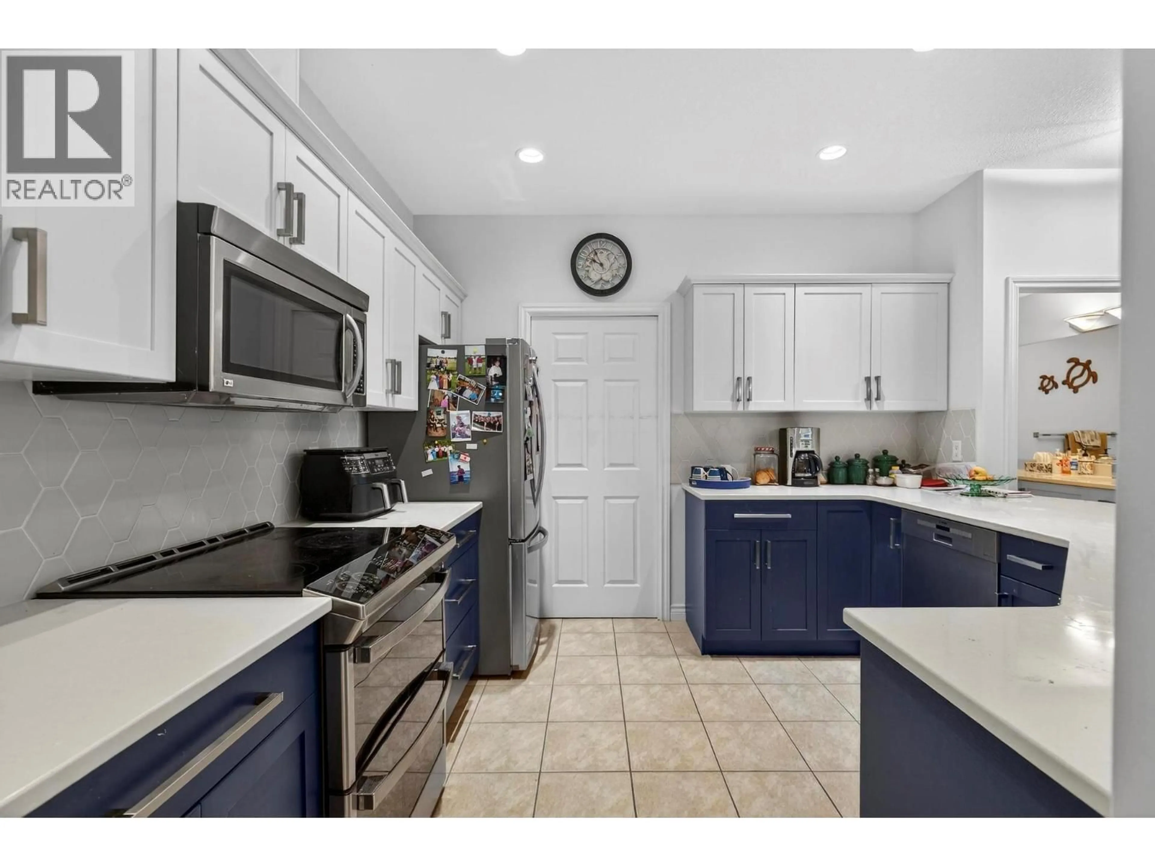 Open concept kitchen, ceramic/tile floor for 211 - 1961 DURNIN ROAD, Kelowna British Columbia V1X7Z6