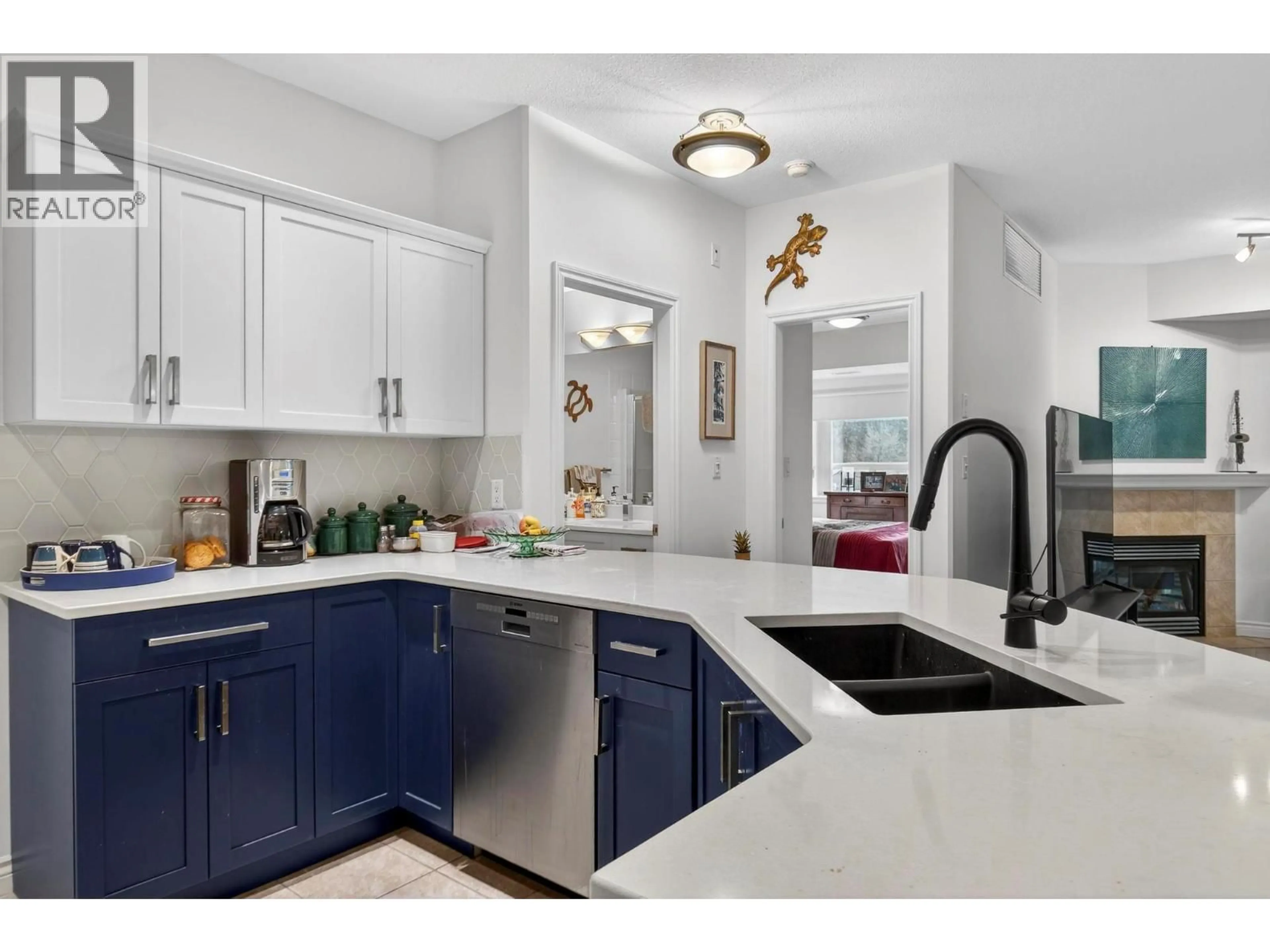 Open concept kitchen, ceramic/tile floor for 211 - 1961 DURNIN ROAD, Kelowna British Columbia V1X7Z6