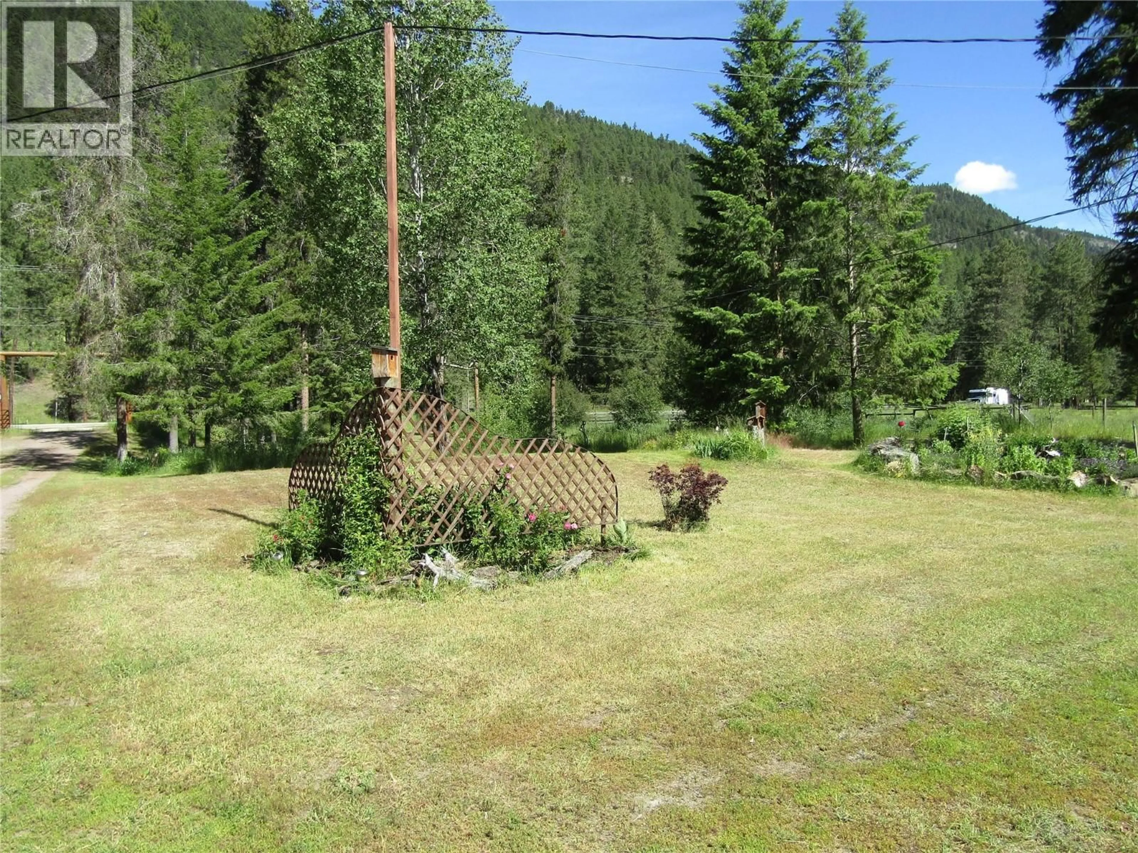 A pic from outside/outdoor area/front of a property/back of a property/a pic from drone, forest/trees view for 3260 CHRISTIAN VALLEY ROAD, Westbridge British Columbia V0H1Y0
