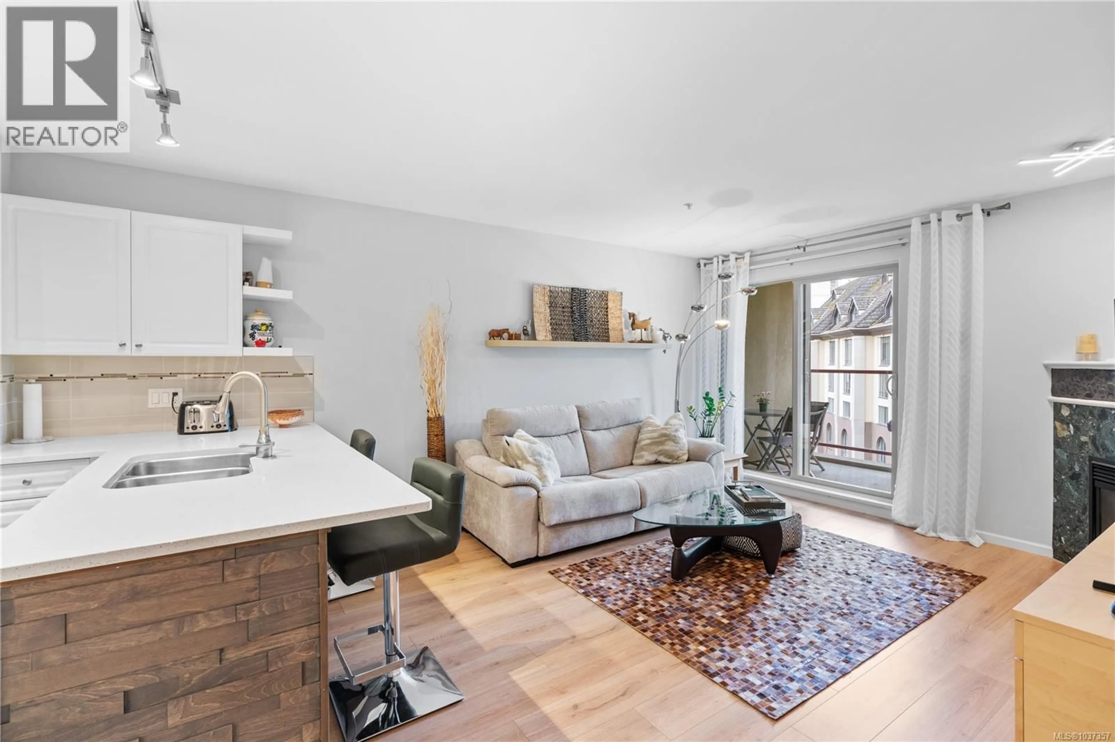 Living room with furniture, unknown for 416 - 29 SONGHEES ROAD, Victoria British Columbia V9A7M6