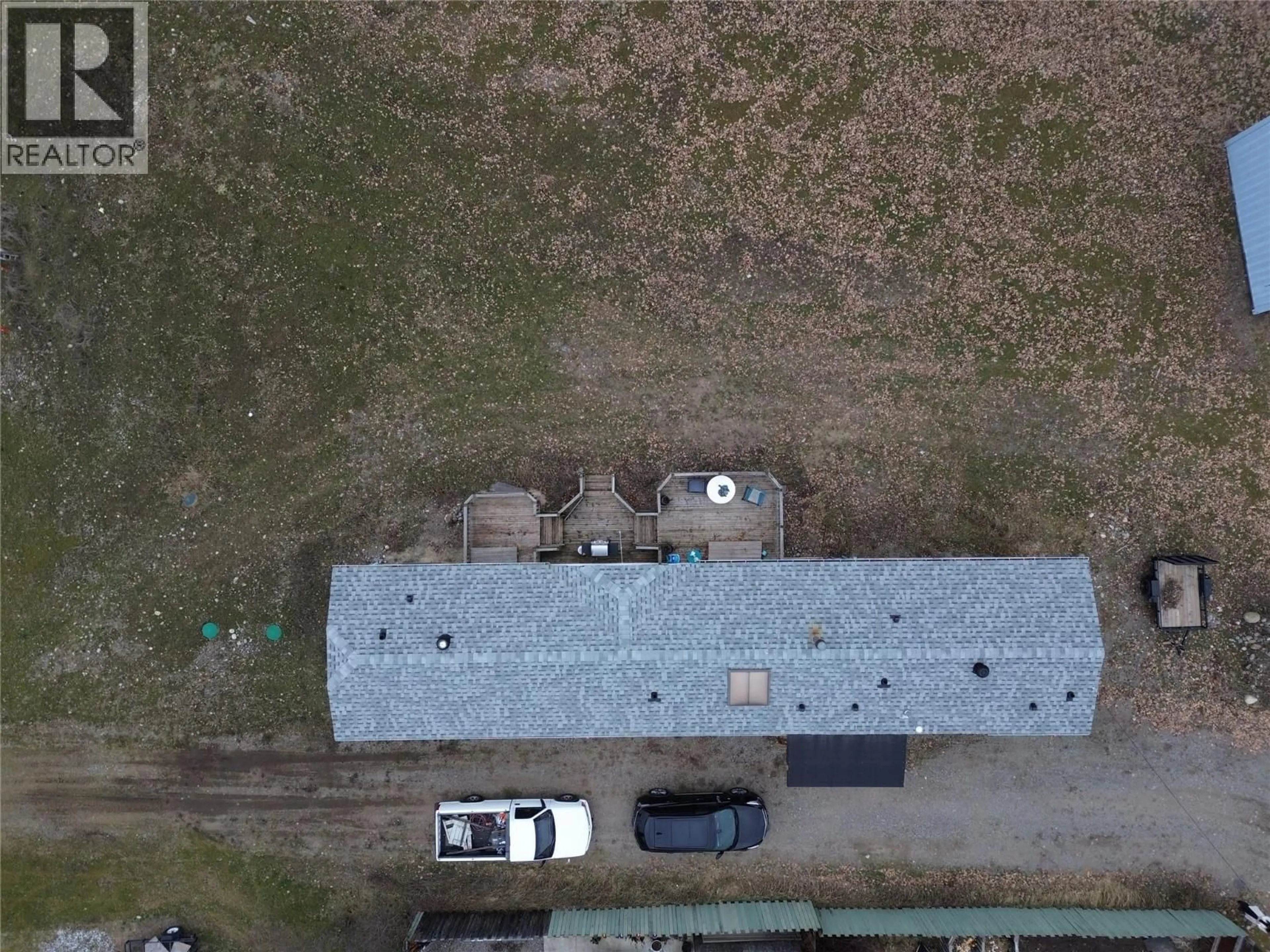 A pic from outside/outdoor area/front of a property/back of a property/a pic from drone, building for 6473 5TH STREET, Grand Forks British Columbia V0H1H0