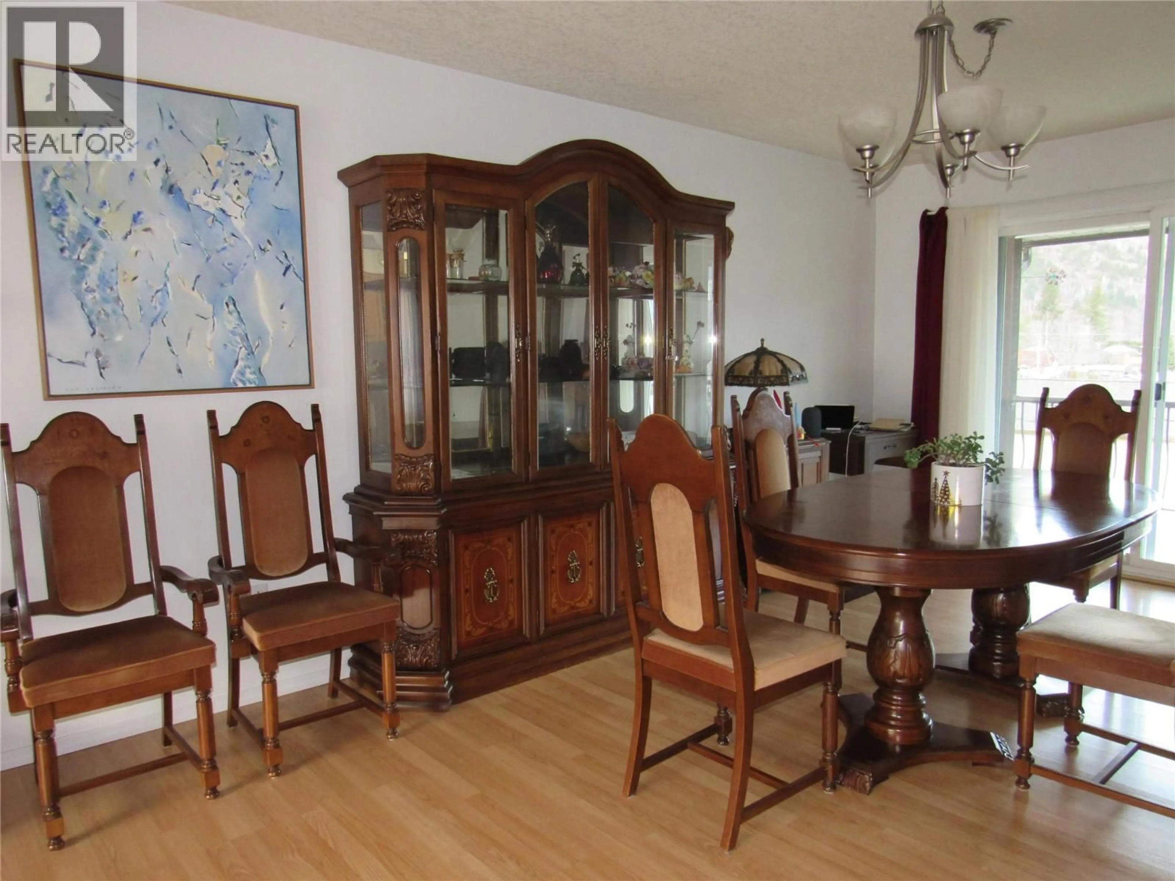 Dining room, wood/laminate floor for 519 10TH AVENUE, Castlegar British Columbia V1N1K6