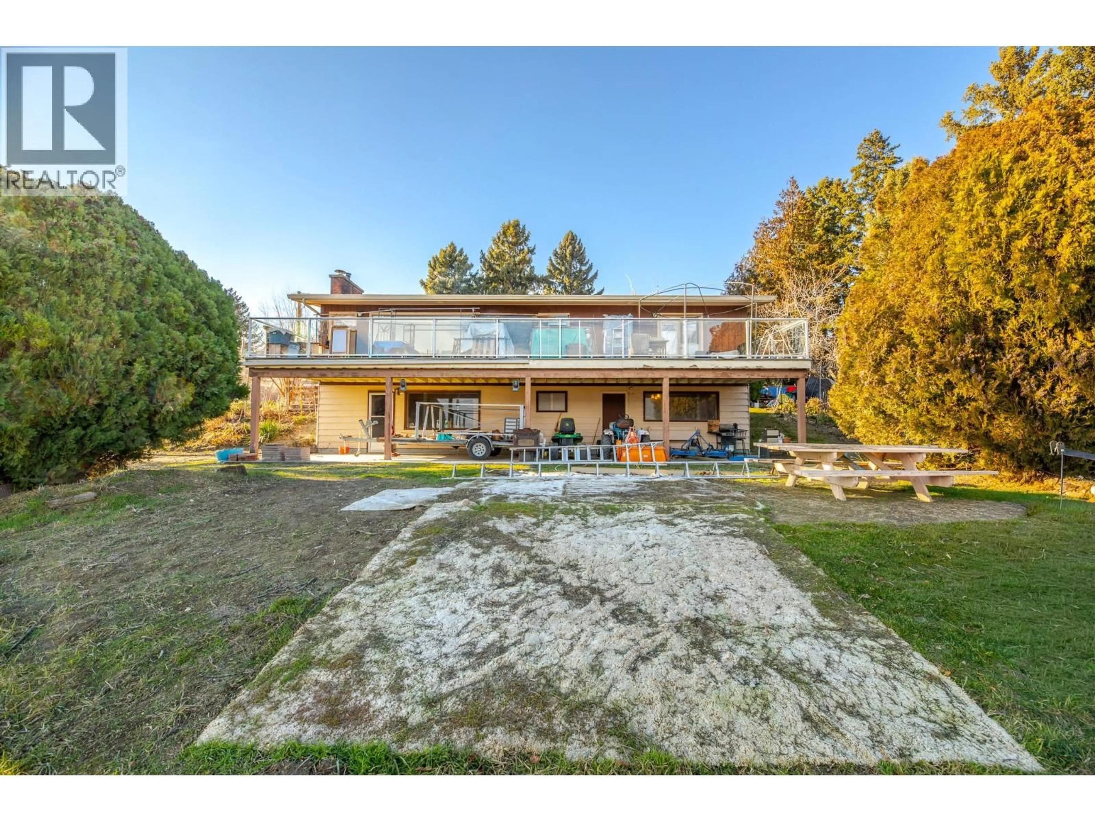 A pic from outside/outdoor area/front of a property/back of a property/a pic from drone, unknown for 1411 SPARTAN DRIVE, Penticton British Columbia V2A8Z5