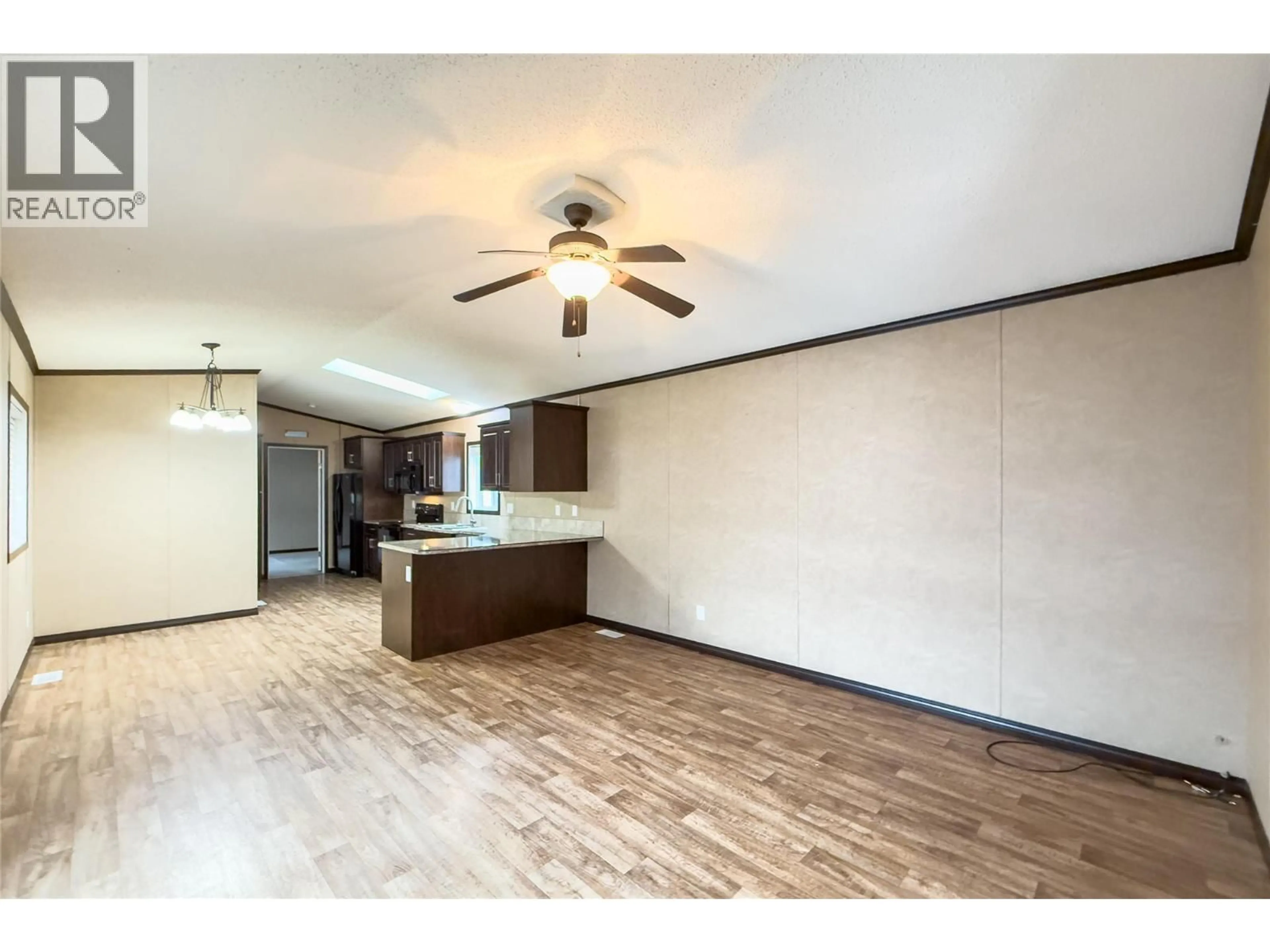 Open concept kitchen, wood/laminate floor for 35 - 1400 12TH STREET, Golden British Columbia V0A1H1