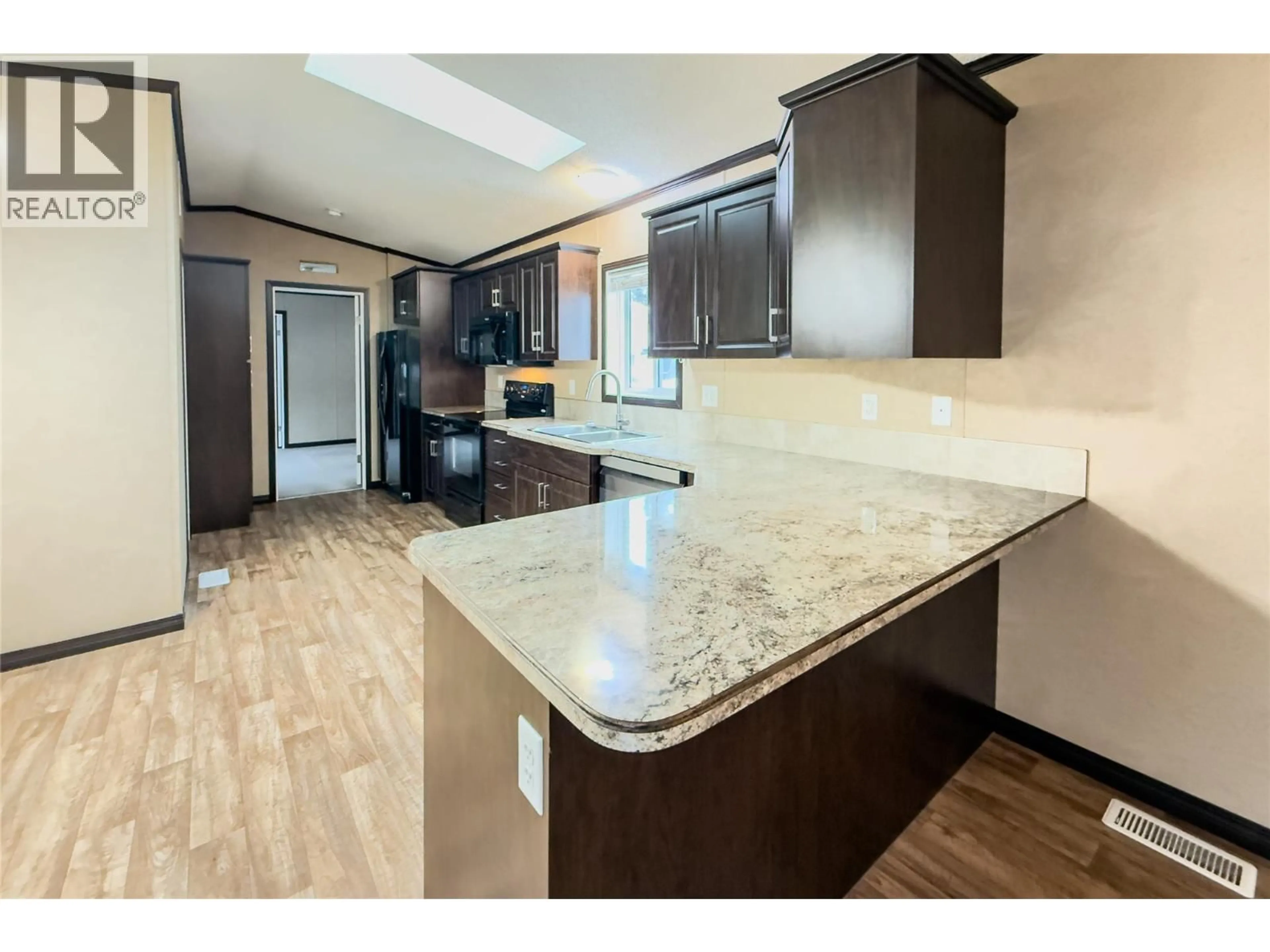 Open concept kitchen, ceramic/tile floor for 35 - 1400 12TH STREET, Golden British Columbia V0A1H1