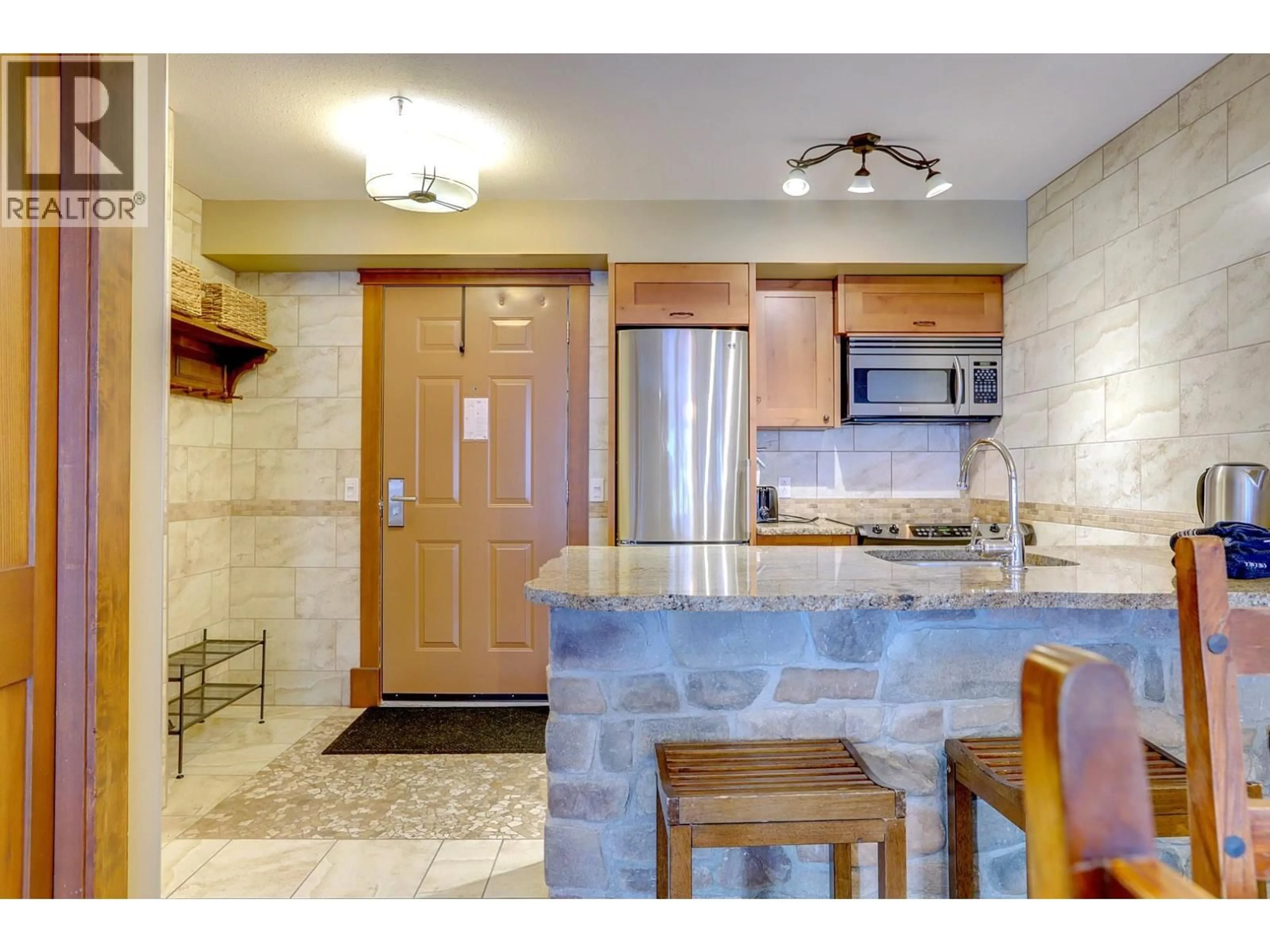 Open concept kitchen, ceramic/tile floor for 367 - 155 SILVER LODE LANE, Vernon British Columbia V1B3M1