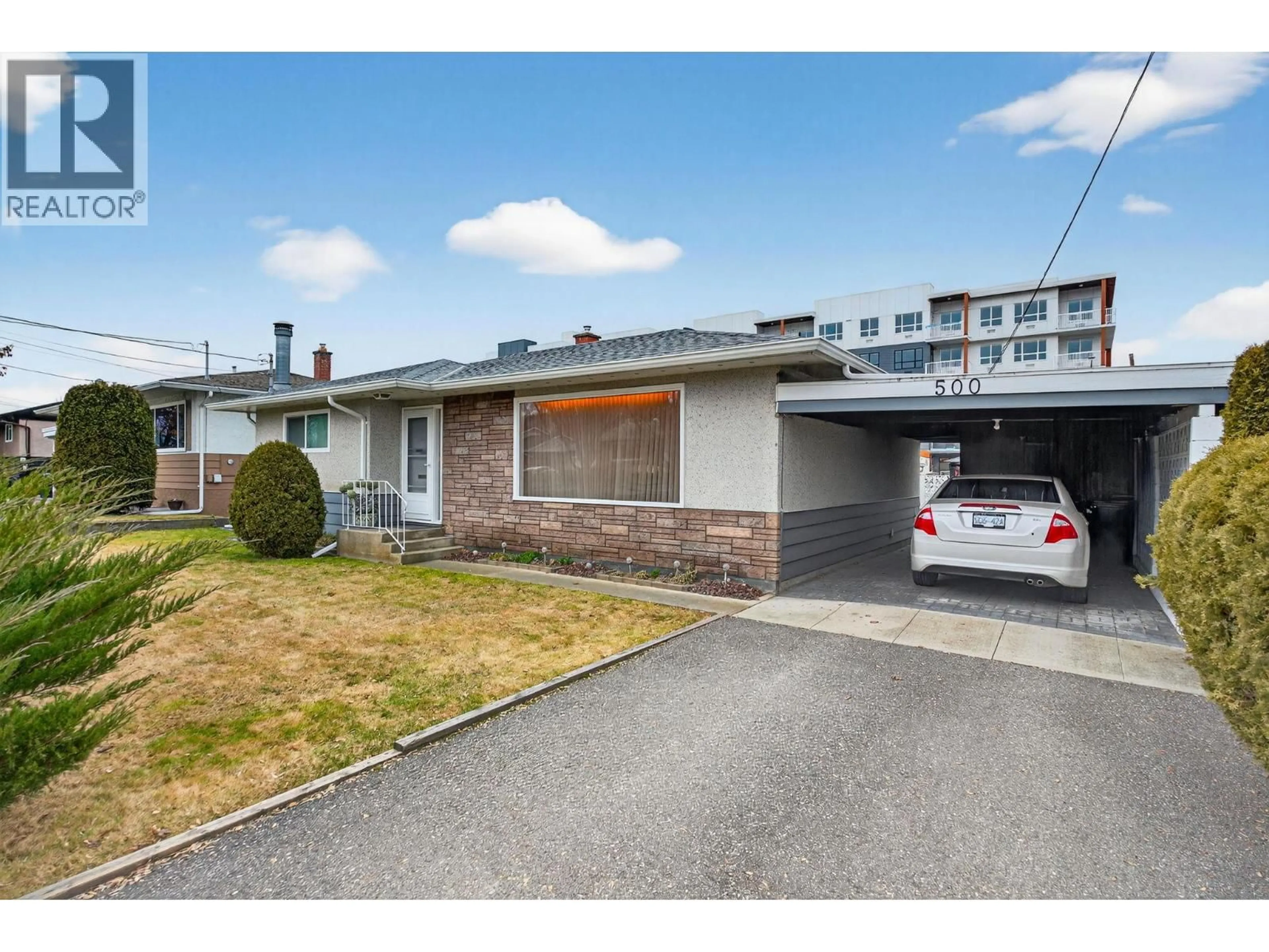 A pic from outside/outdoor area/front of a property/back of a property/a pic from drone, street for 500 MCDONALD ROAD, Kelowna British Columbia V1X3H2