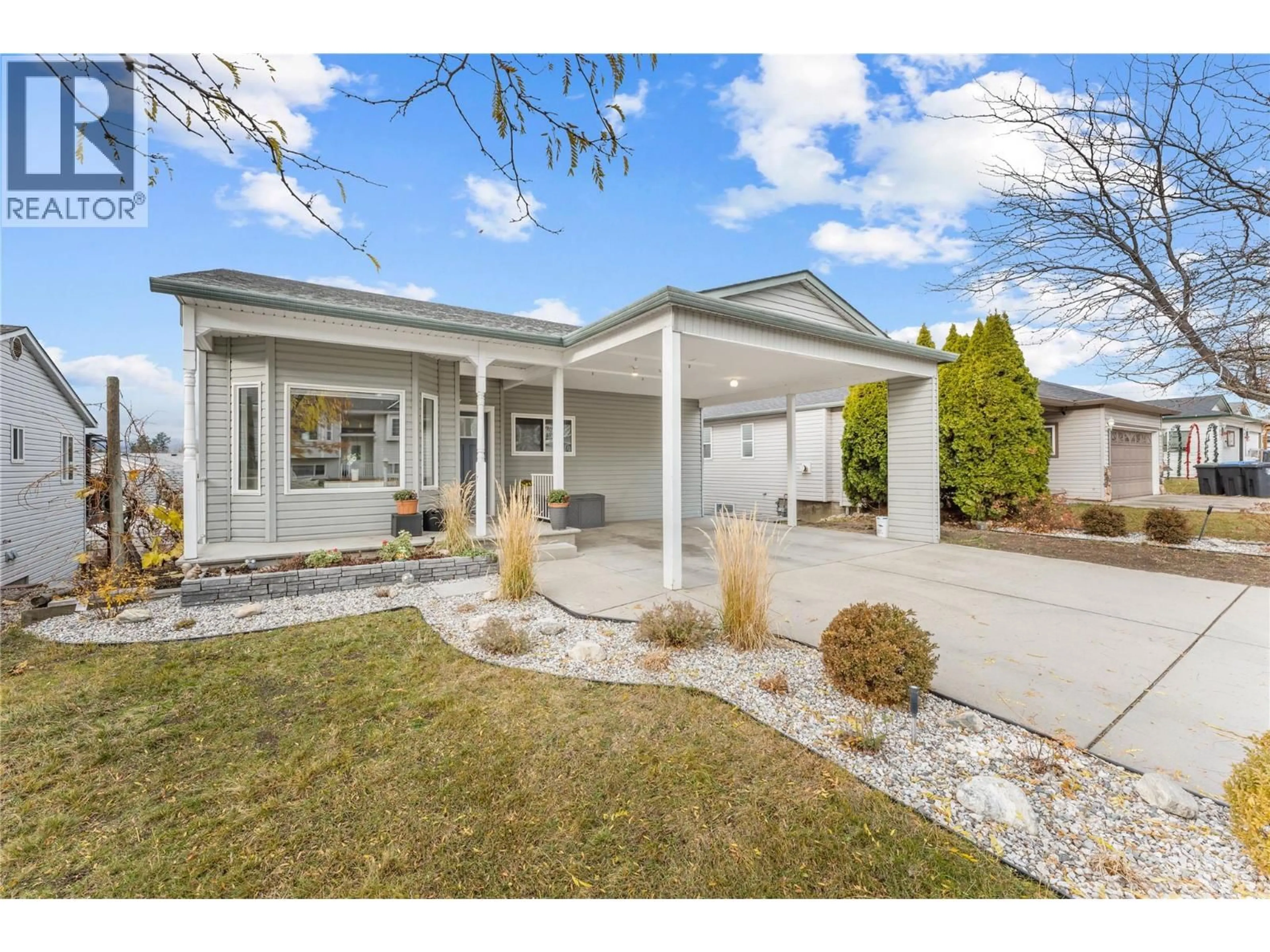 Home with vinyl exterior material, street for 45 - 6100 OLD VERNON ROAD, Kelowna British Columbia V1X7T8