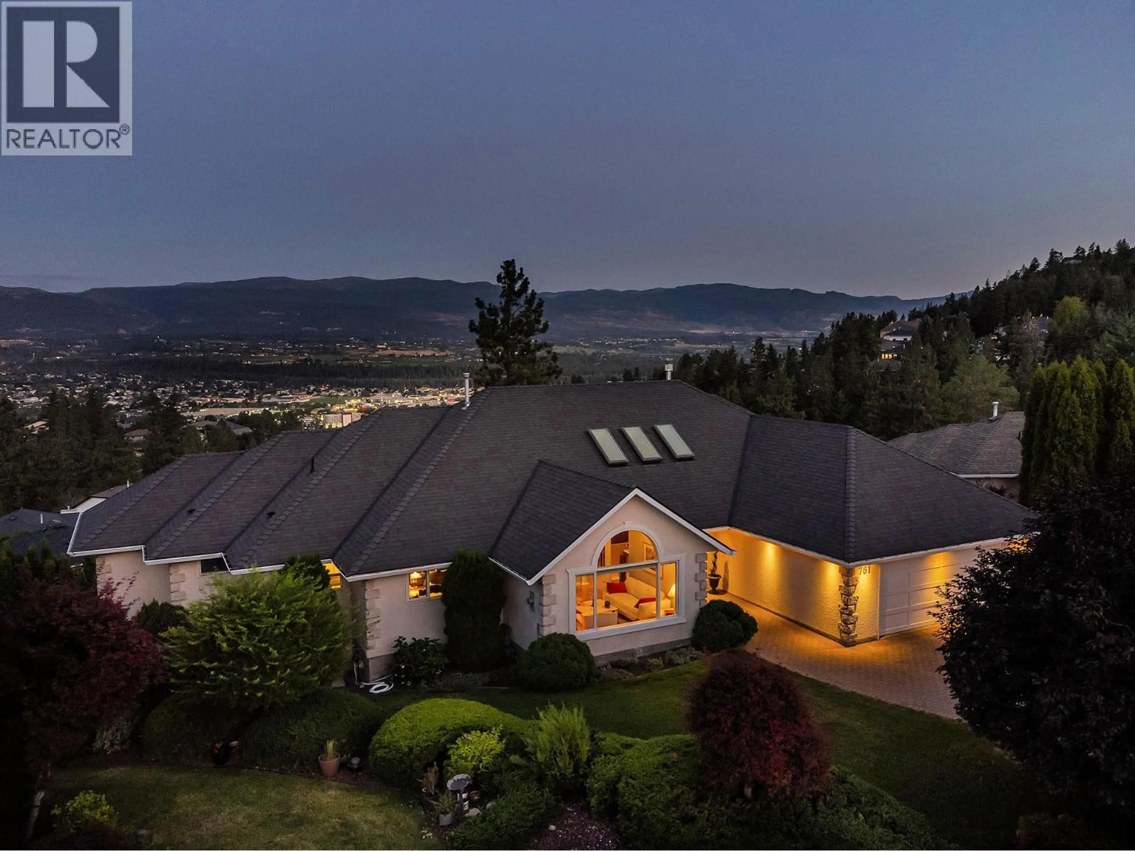 A pic from outside/outdoor area/front of a property/back of a property/a pic from drone, mountain view for 761 SIWASH COURT, Kelowna British Columbia V1V1N5