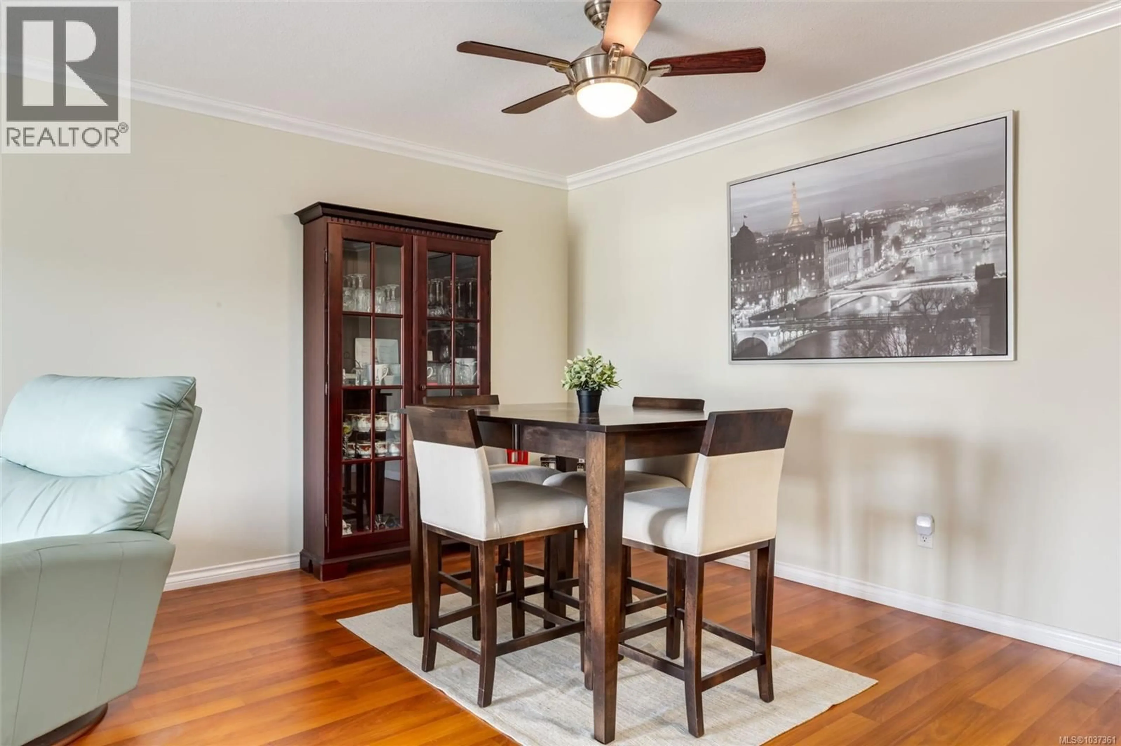 Dining room, wood/laminate floor for 103 - 4971 SONGBIRD PLACE, Nanaimo British Columbia V9T6L1