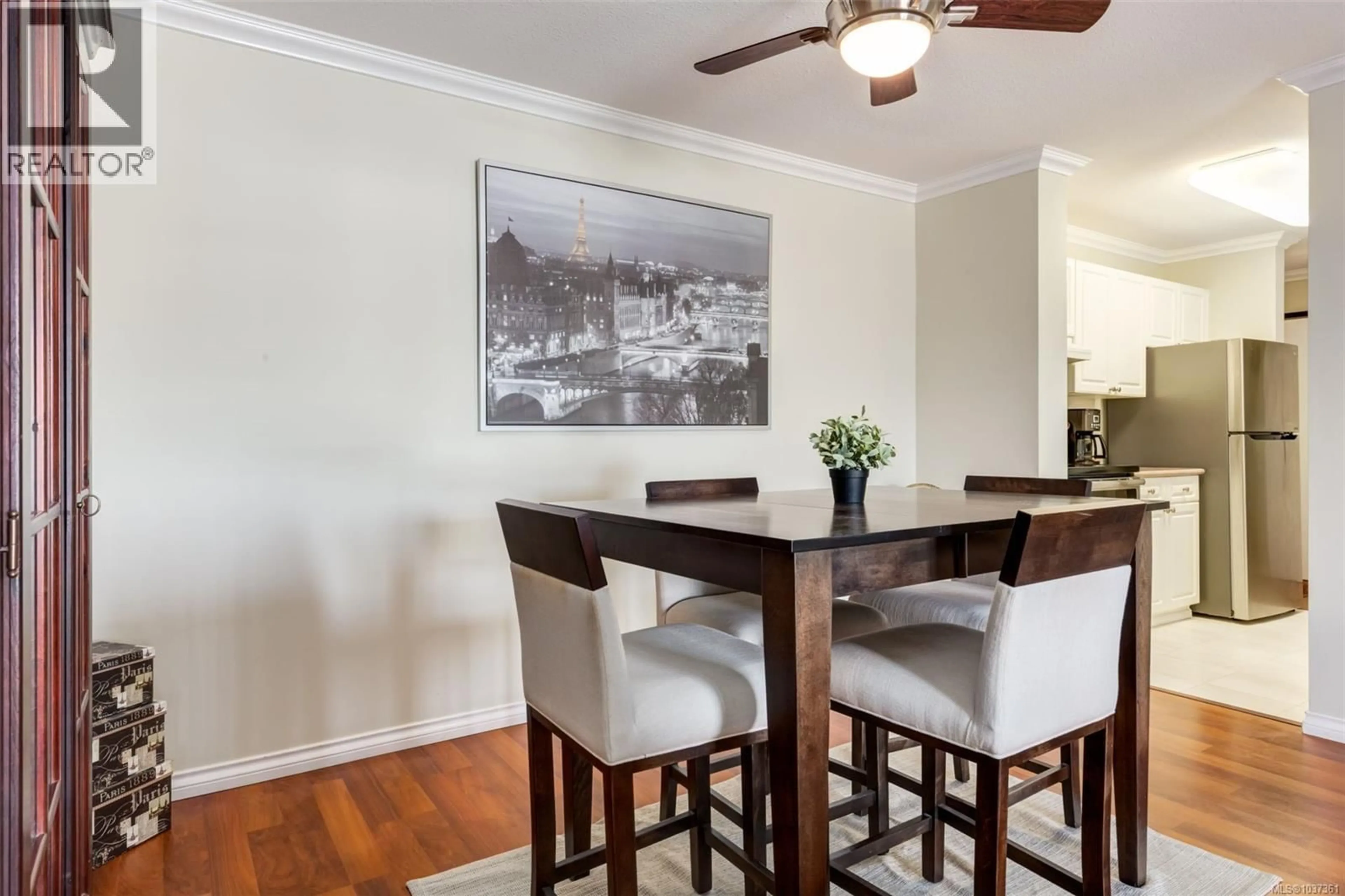 Dining room, wood/laminate floor for 103 - 4971 SONGBIRD PLACE, Nanaimo British Columbia V9T6L1