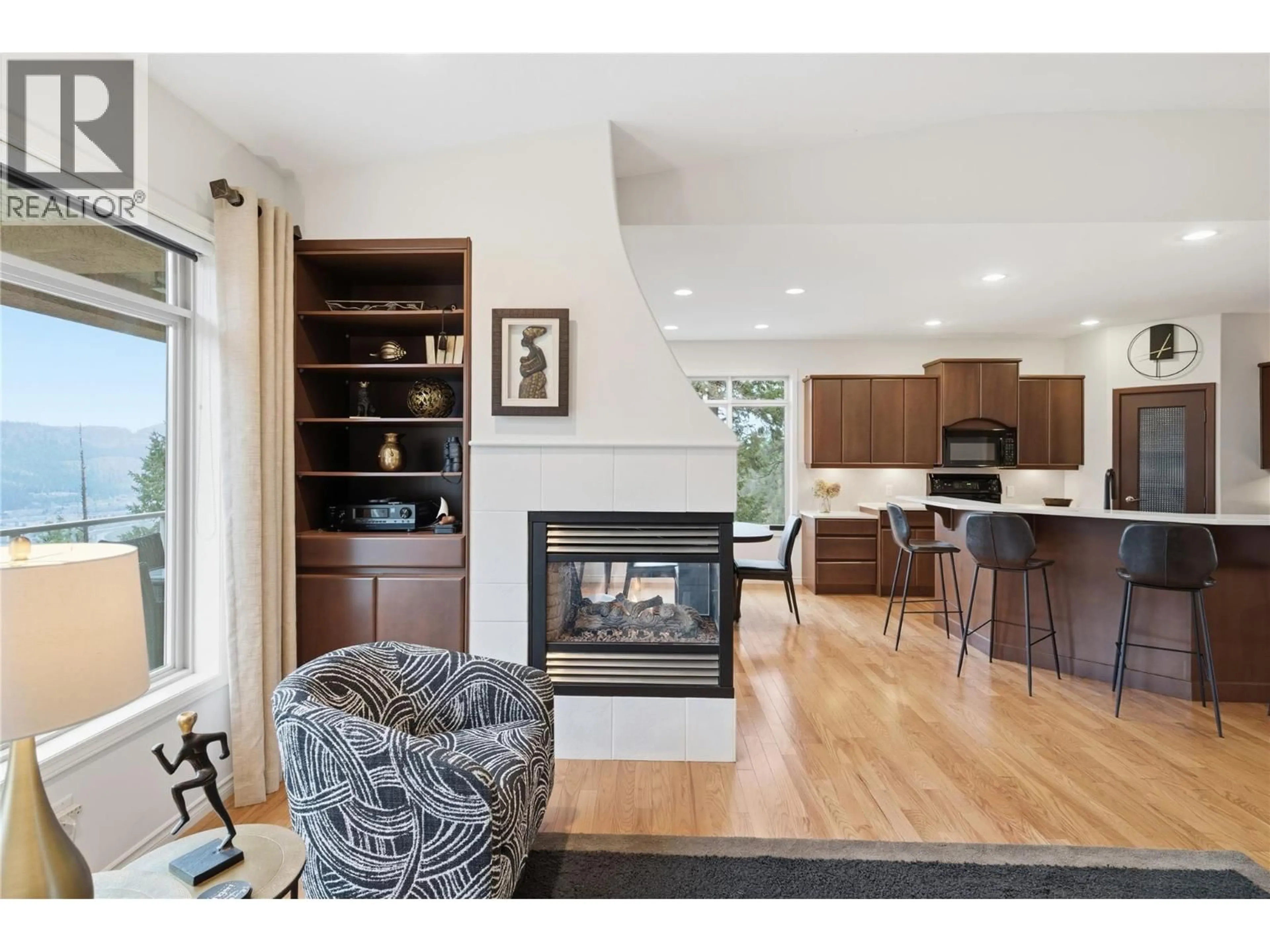 Open concept kitchen, wood/laminate floor for 16 - 2213 WADDINGTON COURT, Kelowna British Columbia V1V4P4