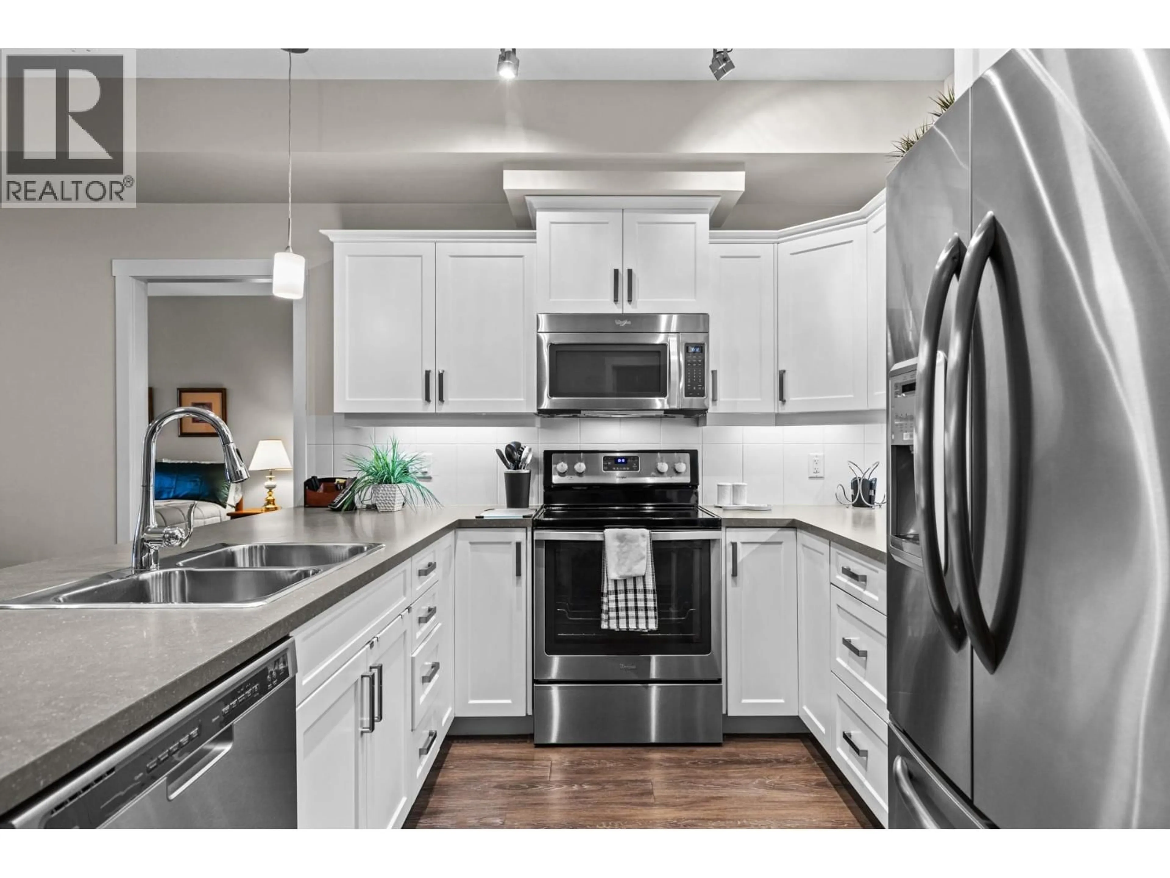 Open concept kitchen, unknown for 111 - 3733 CASORSO ROAD, Kelowna British Columbia V1W5E3