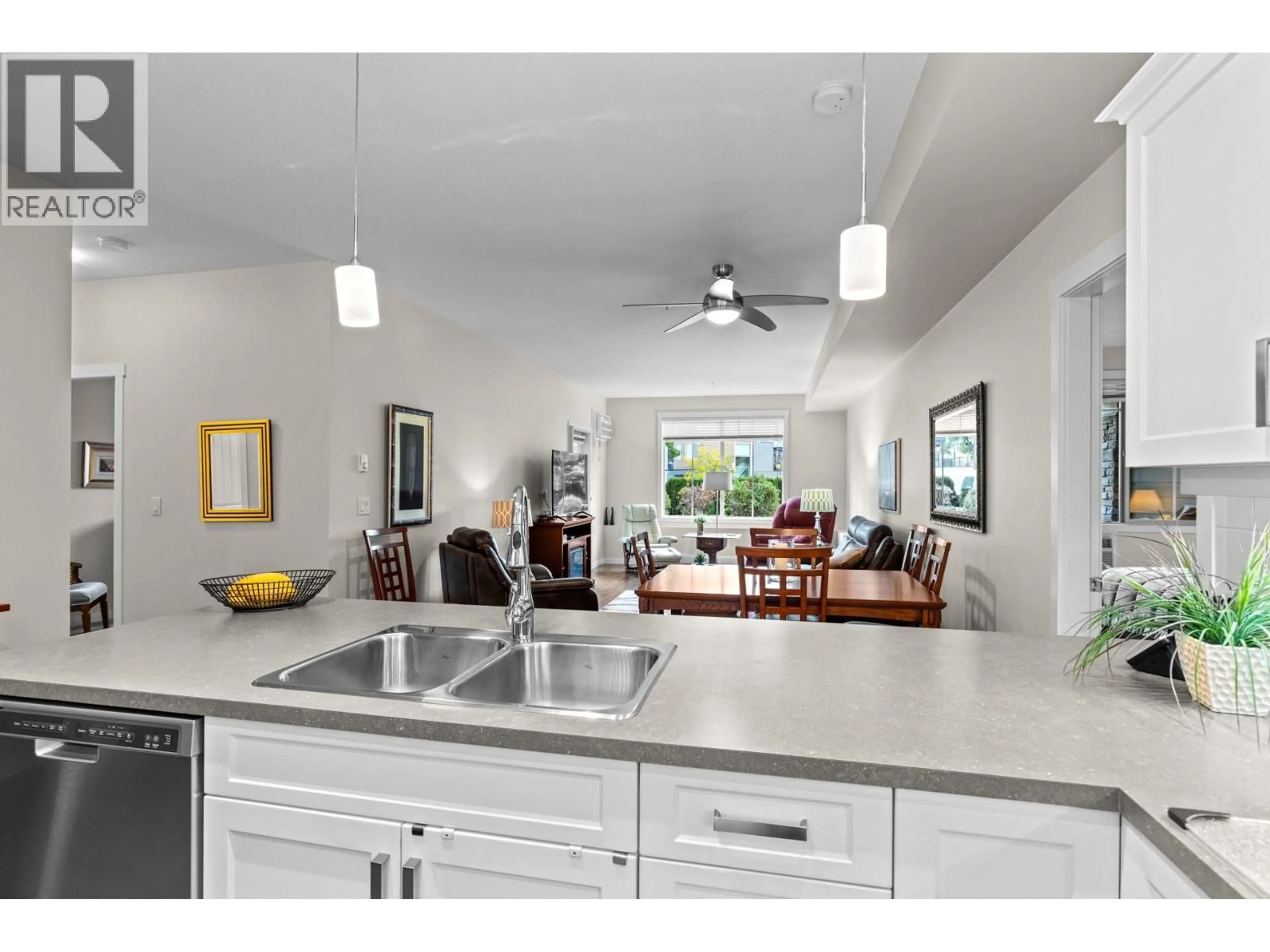 Open concept kitchen, ceramic/tile floor for 111 - 3733 CASORSO ROAD, Kelowna British Columbia V1W5E3