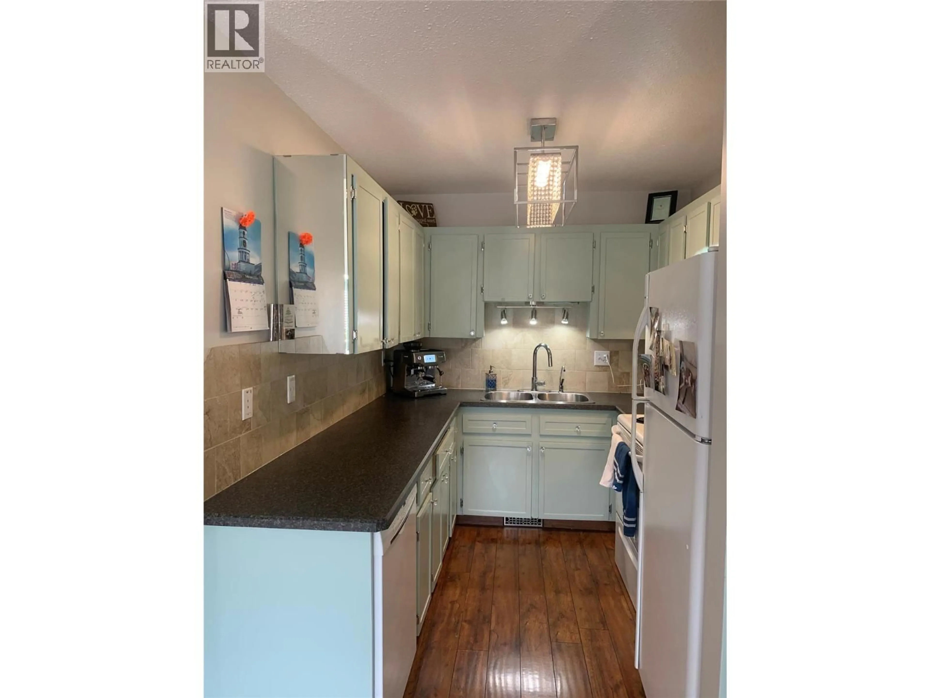 Open concept kitchen, unknown for 407 - 3155 GORDON DRIVE, Kelowna British Columbia V1W3N6