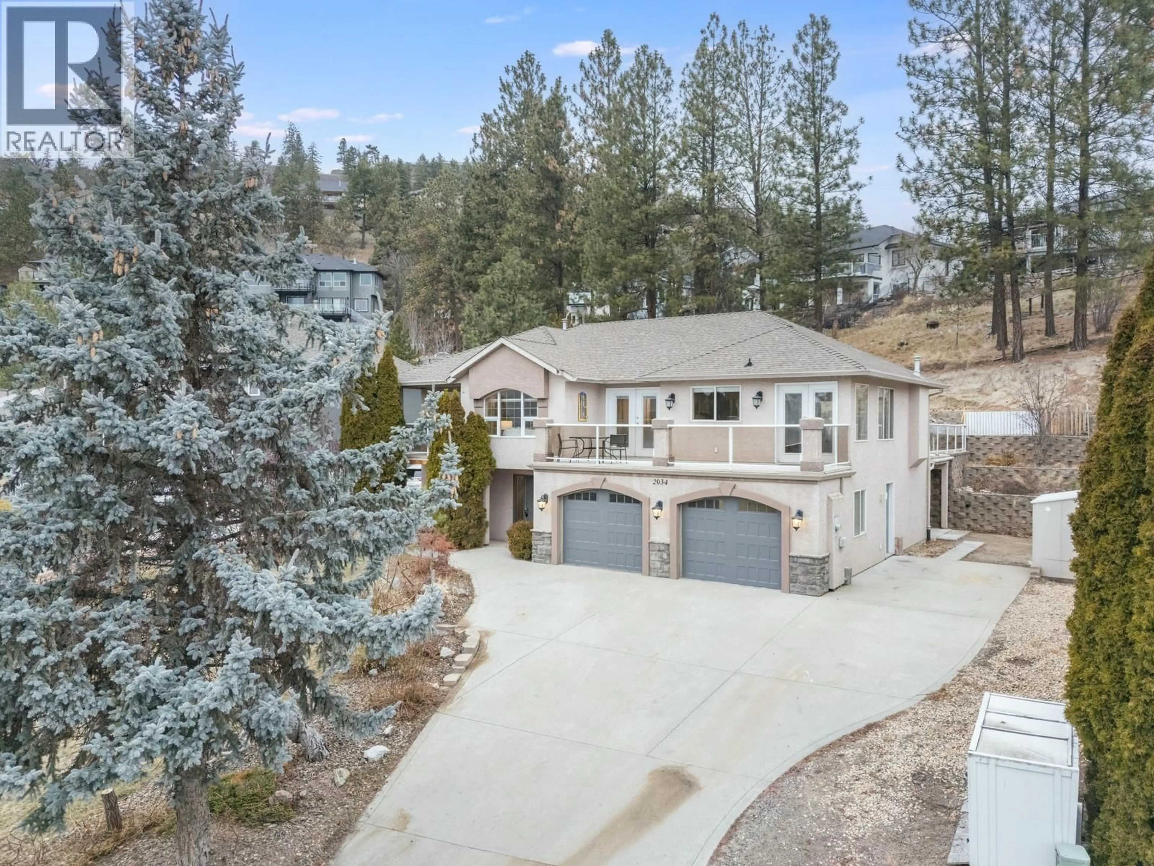 A pic from outside/outdoor area/front of a property/back of a property/a pic from drone, mountain view for 2034 HORIZON DRIVE, West Kelowna British Columbia V1Z3N4
