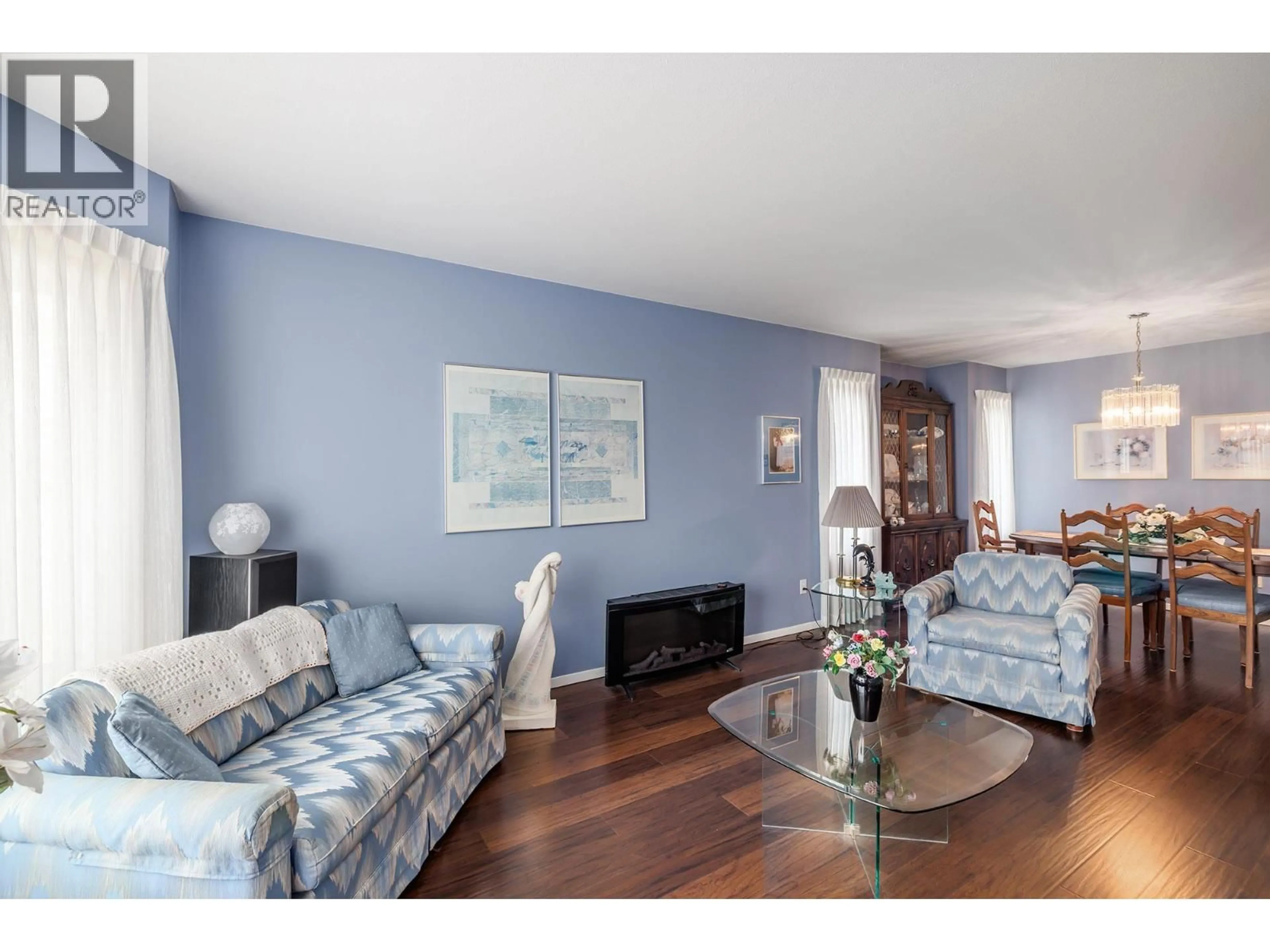 Living room with furniture, wood/laminate floor for 1693 NEWPORT ROAD, West Kelowna British Columbia V4T1X1