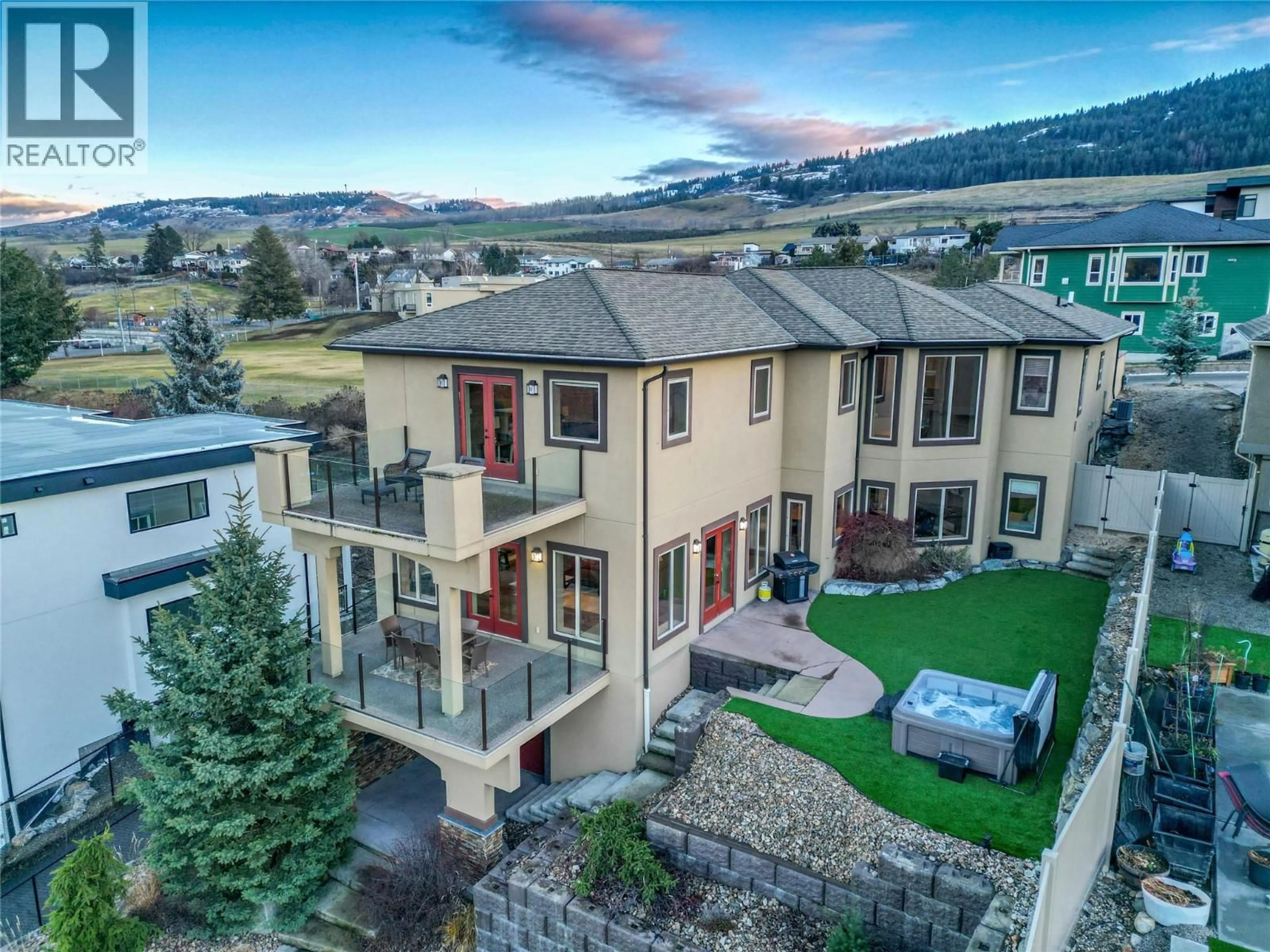 A pic from outside/outdoor area/front of a property/back of a property/a pic from drone, mountain view for 1029 LONGACRE PLACE, Vernon British Columbia V1H1H7