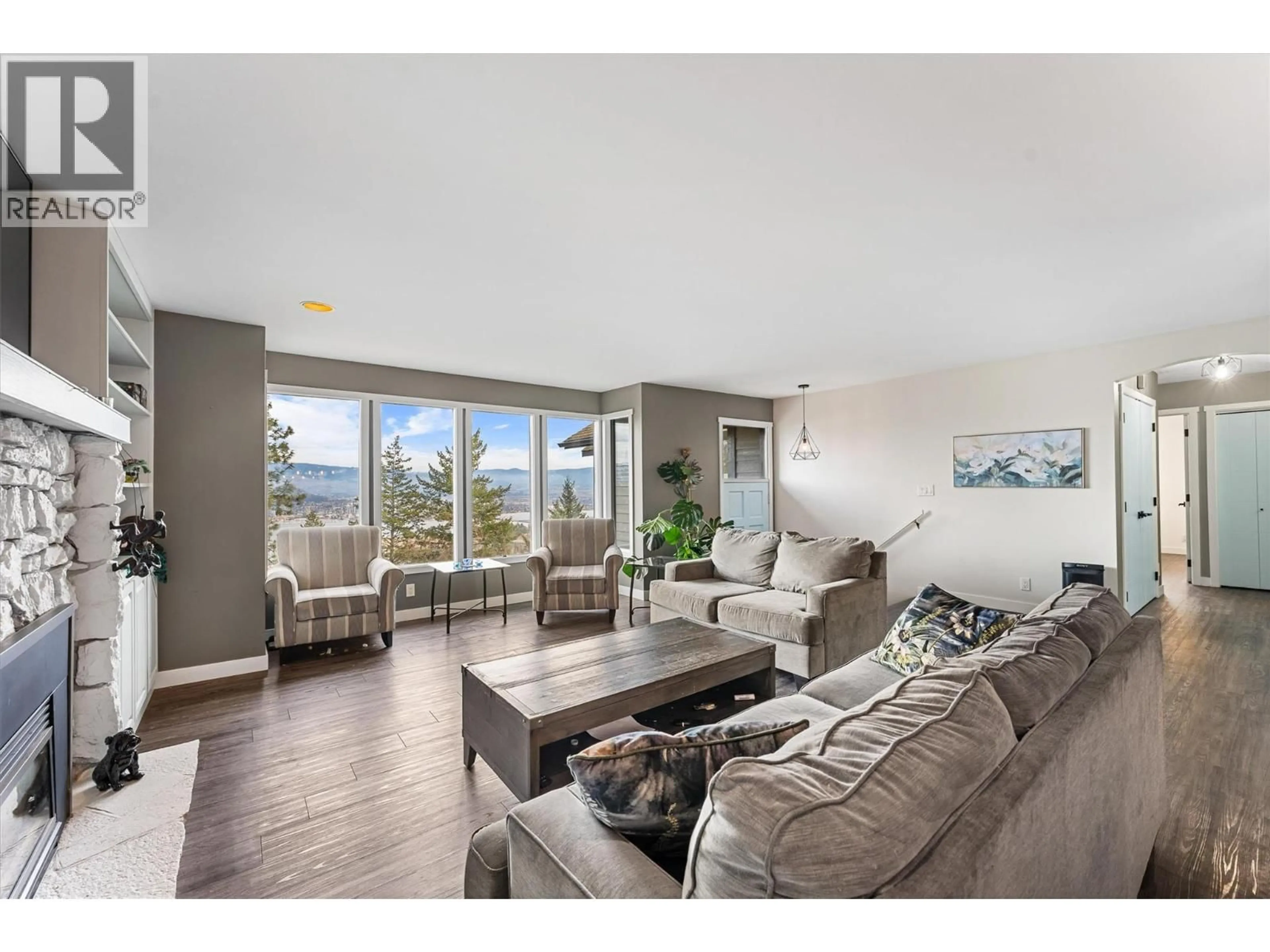 Living room with furniture, wood/laminate floor for 1642 GRIFFITHS PLACE, West Kelowna British Columbia V1Z2T7