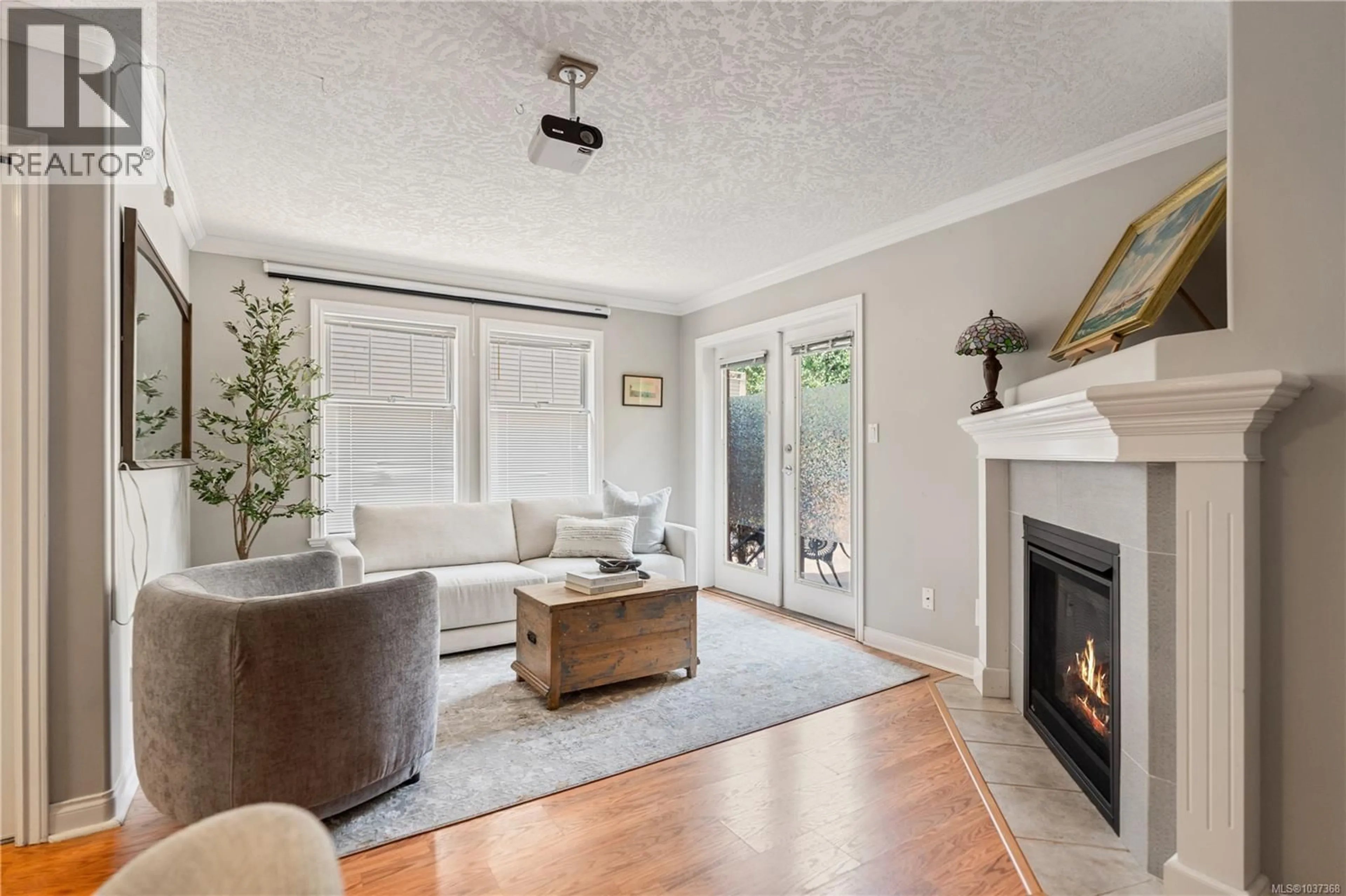 Living room with furniture, wood/laminate floor for A - 136 SUPERIOR STREET, Victoria British Columbia V8V1T1
