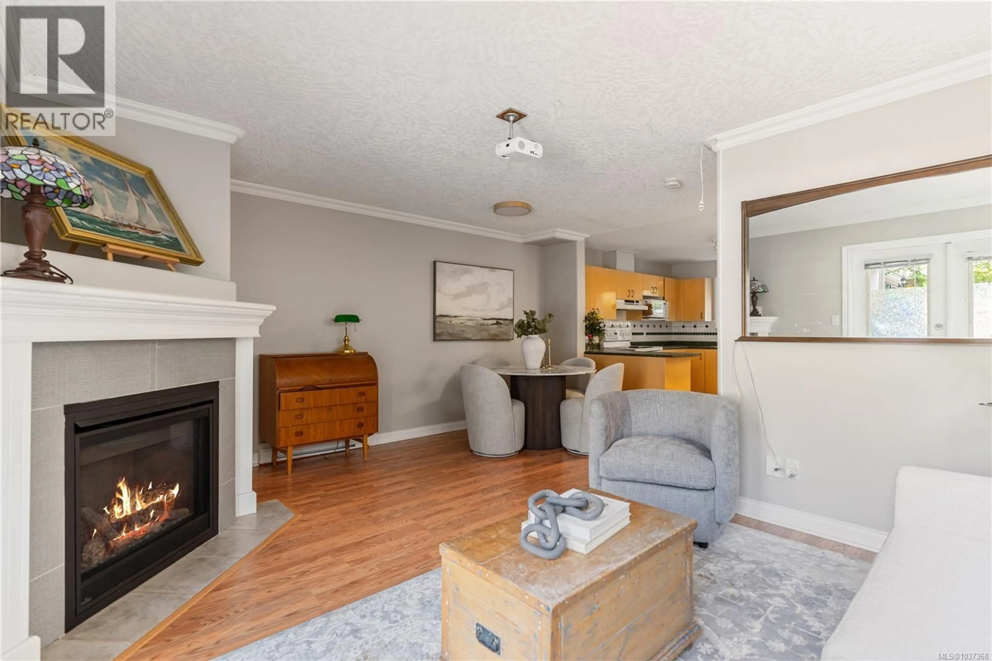 Living room with furniture, wood/laminate floor for A - 136 SUPERIOR STREET, Victoria British Columbia V8V1T1