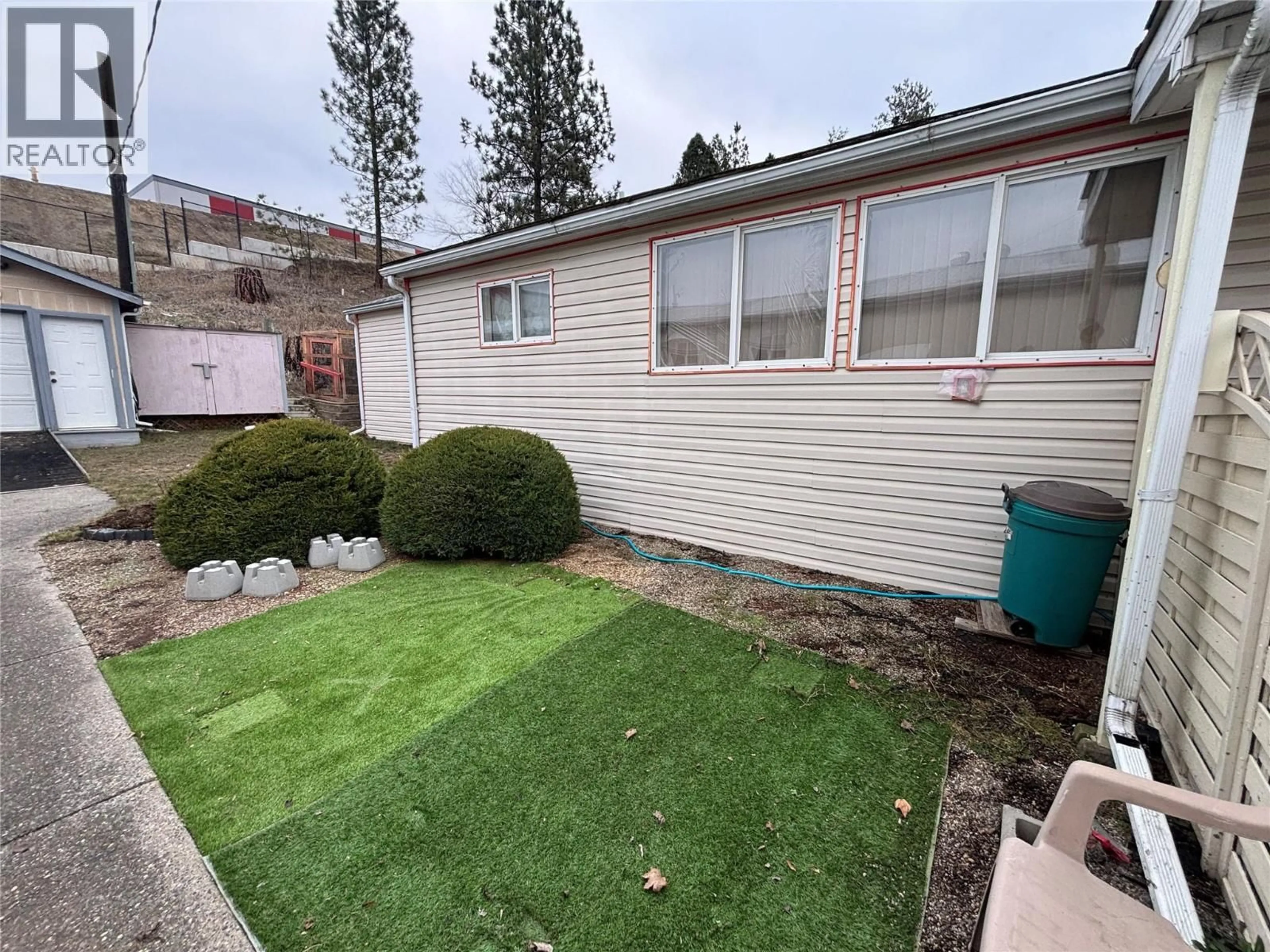 A pic from outside/outdoor area/front of a property/back of a property/a pic from drone, unknown for 43 - 4701 PLEASANT VALLEY ROAD, Vernon British Columbia V1T4M7