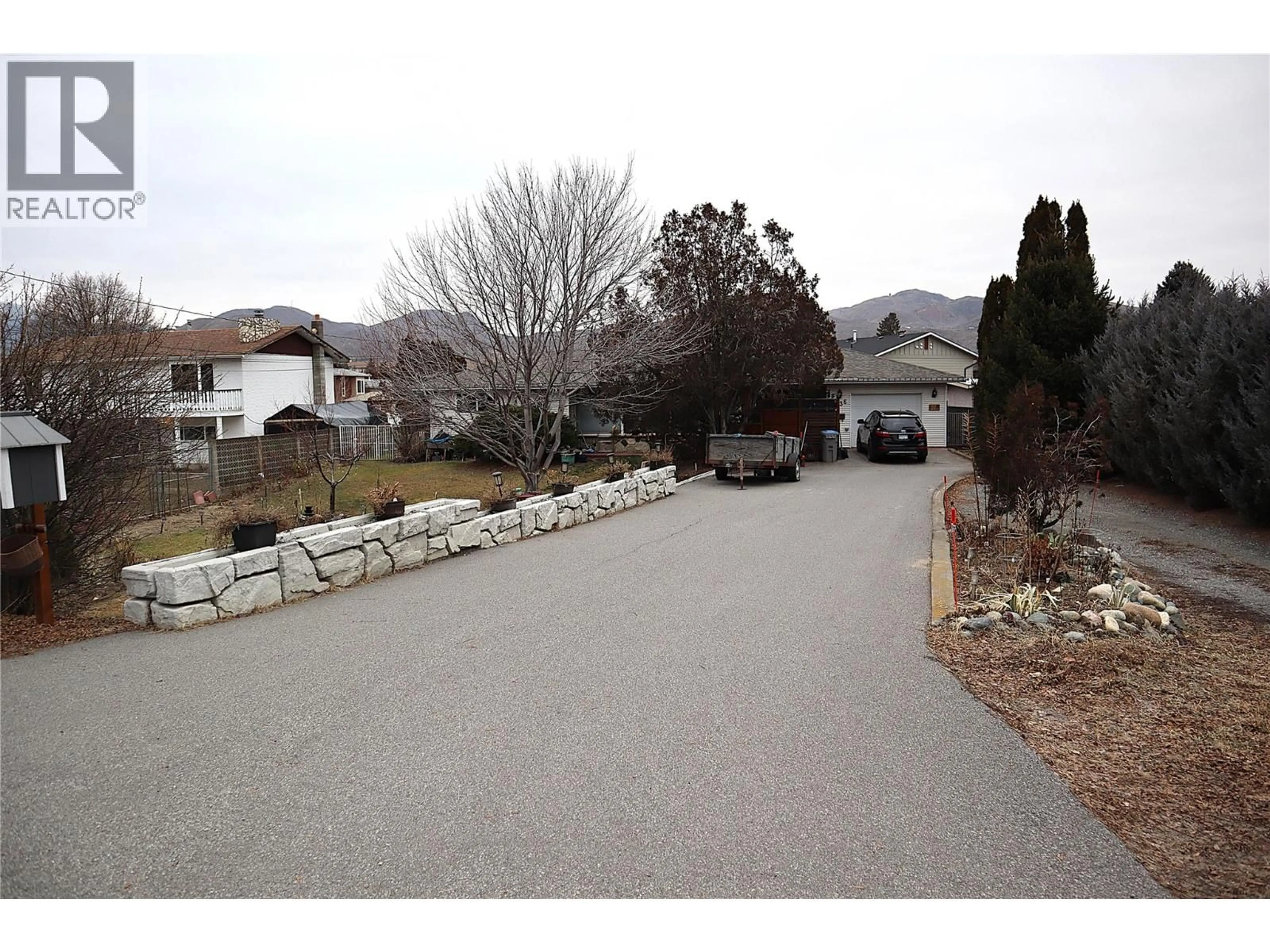 A pic from outside/outdoor area/front of a property/back of a property/a pic from drone, mountain view for 1736 HAPPYVALE AVENUE, Kamloops British Columbia V2B4H5