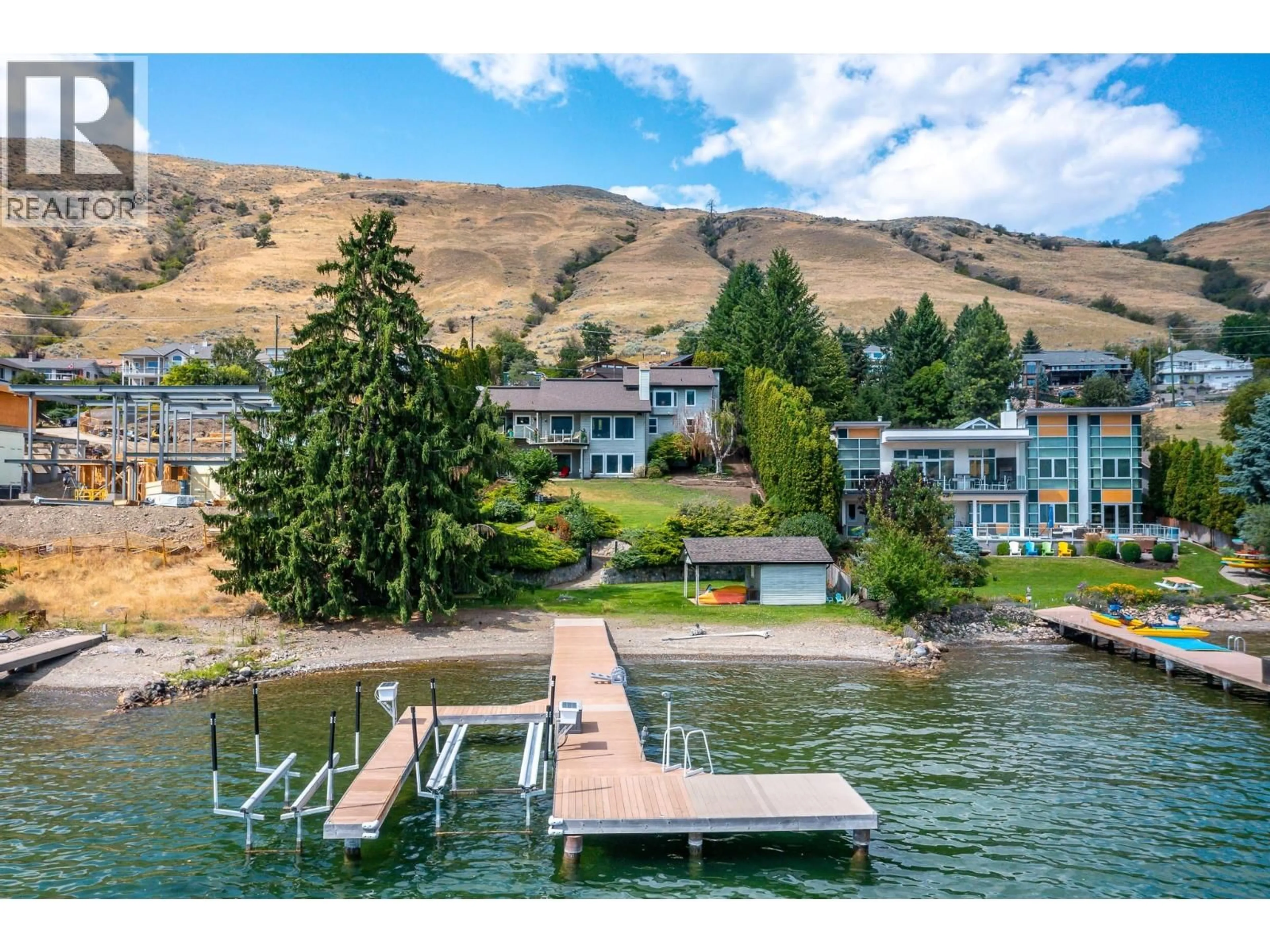 A pic from outside/outdoor area/front of a property/back of a property/a pic from drone, water/lake/river/ocean view for 7994 TRONSON ROAD, Vernon British Columbia V1H1C6