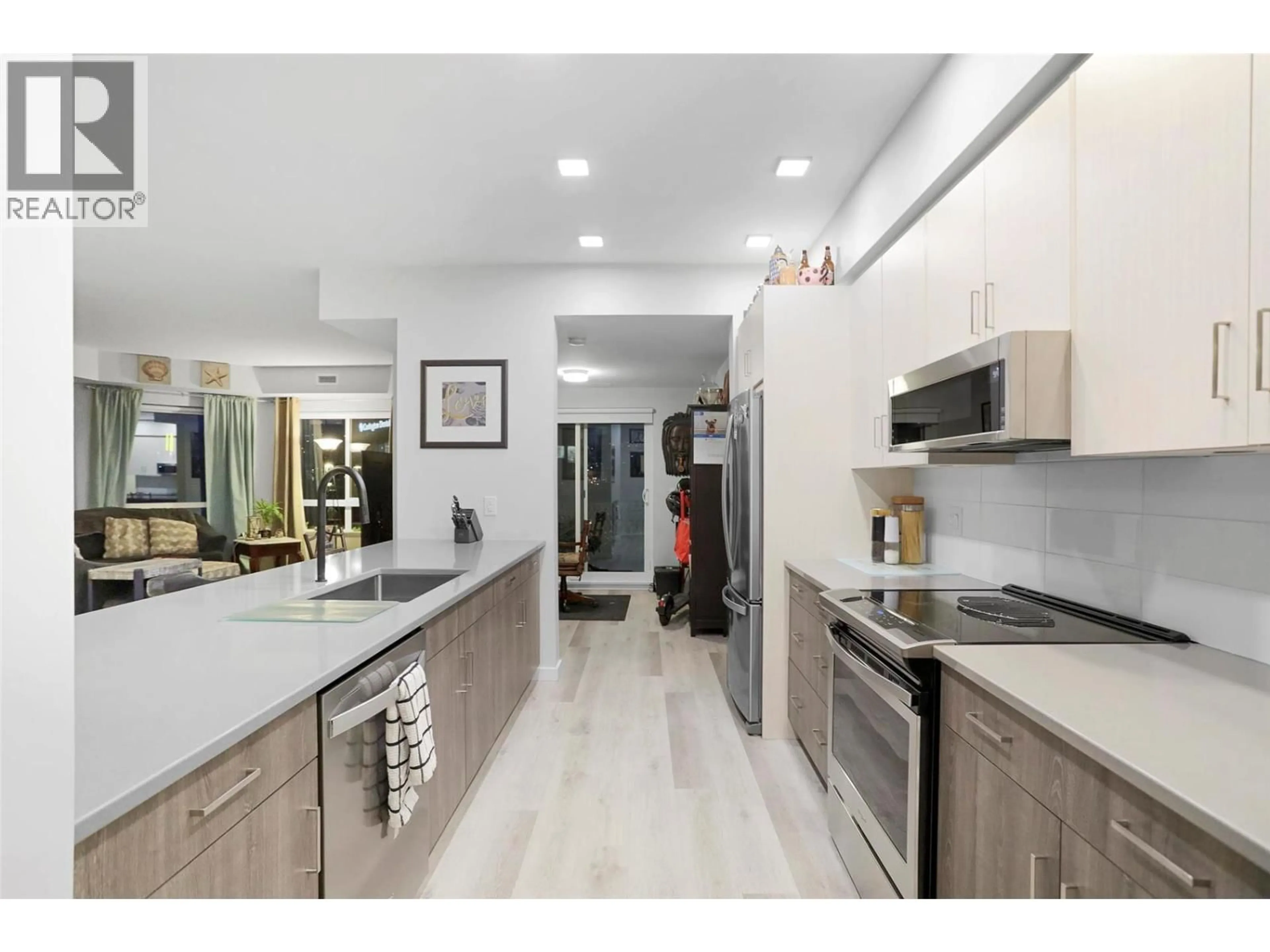 Open concept kitchen, ceramic/tile floor for 306 - 2301 CARRINGTON ROAD, West Kelowna British Columbia V4T0E2