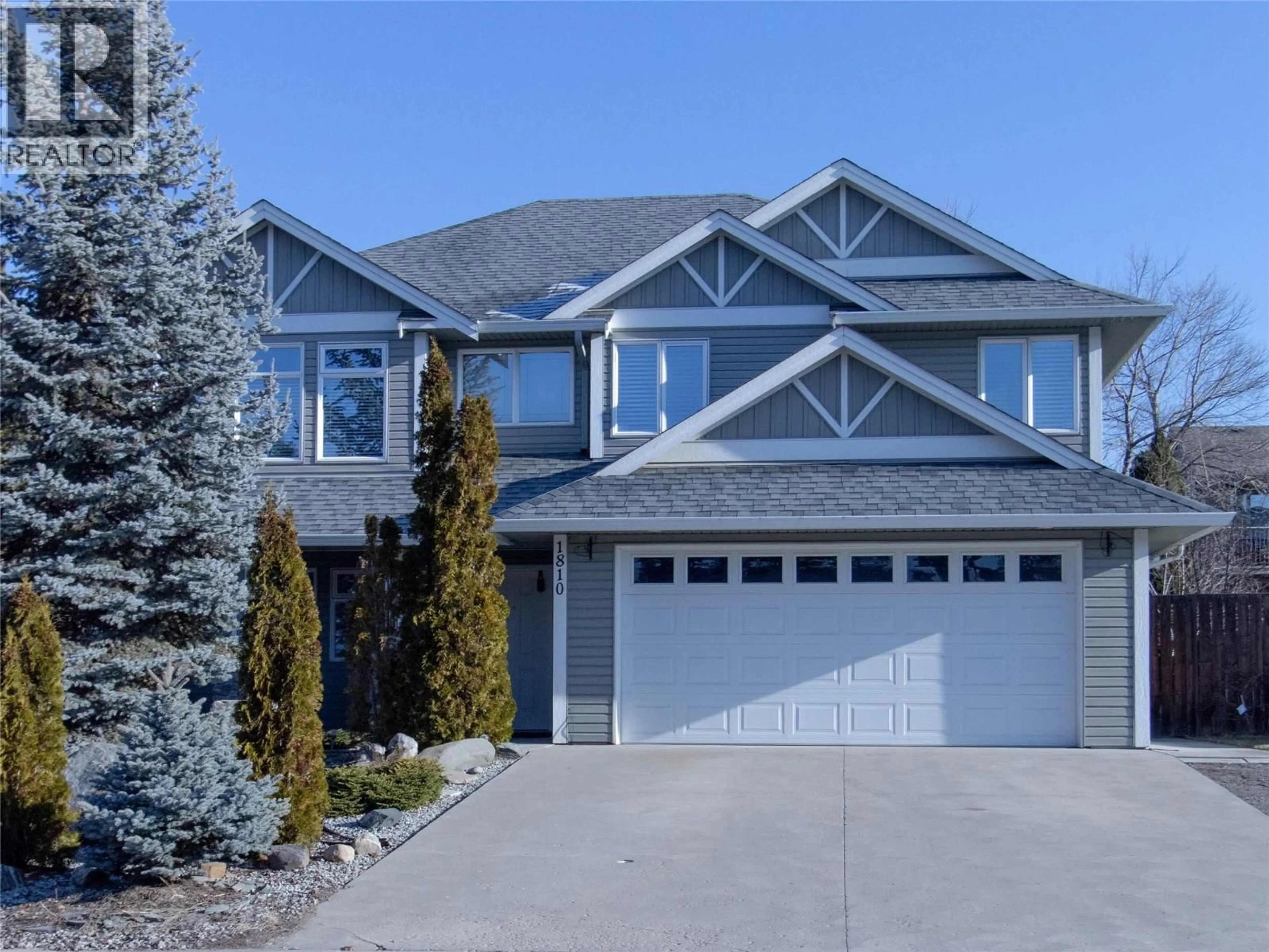 Home with vinyl exterior material, street for 1810 23 STREET NORTHEAST, Salmon Arm British Columbia V1E3M6