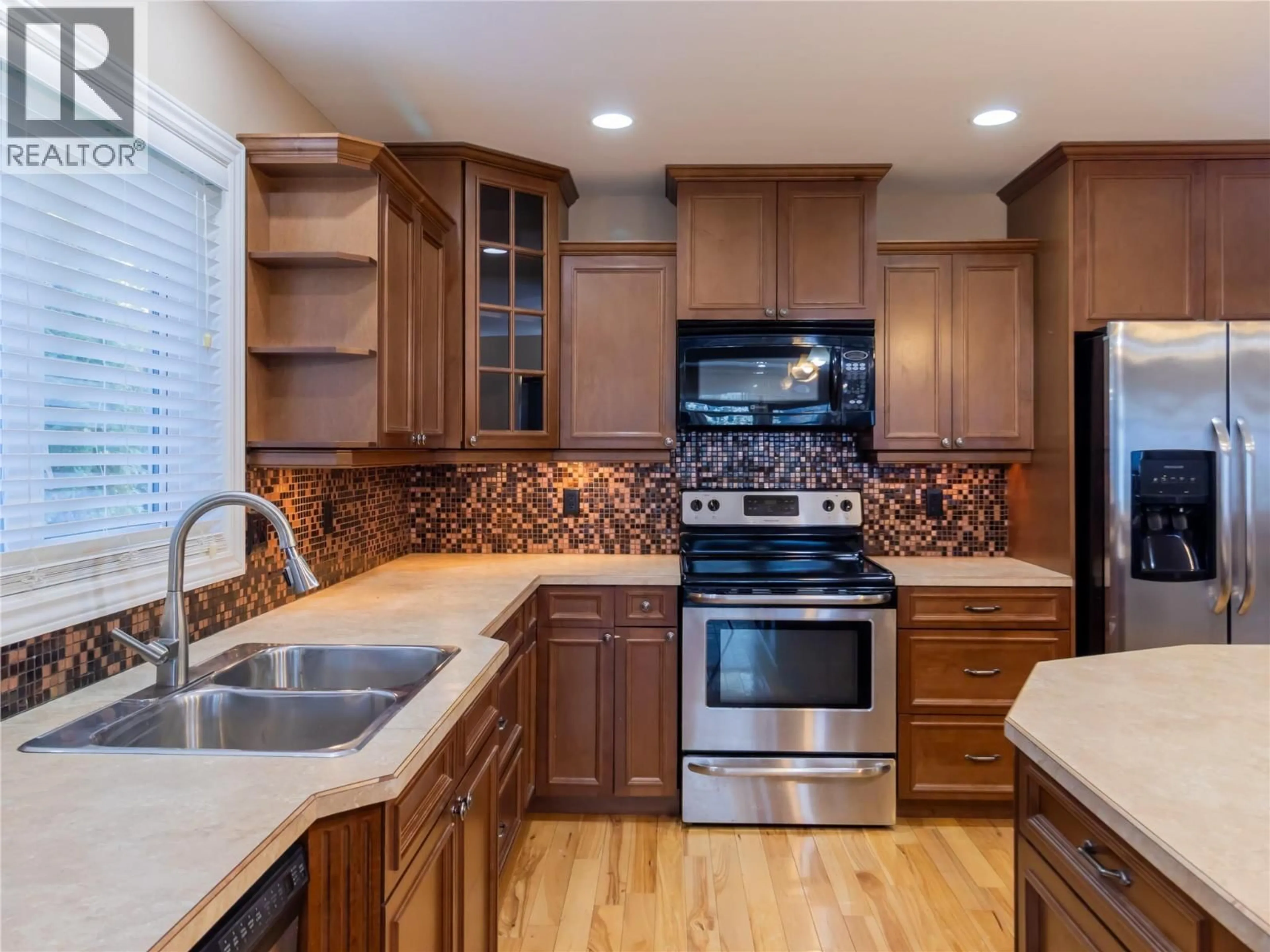 Contemporary kitchen, ceramic/tile floor for 1810 23 STREET NORTHEAST, Salmon Arm British Columbia V1E3M6