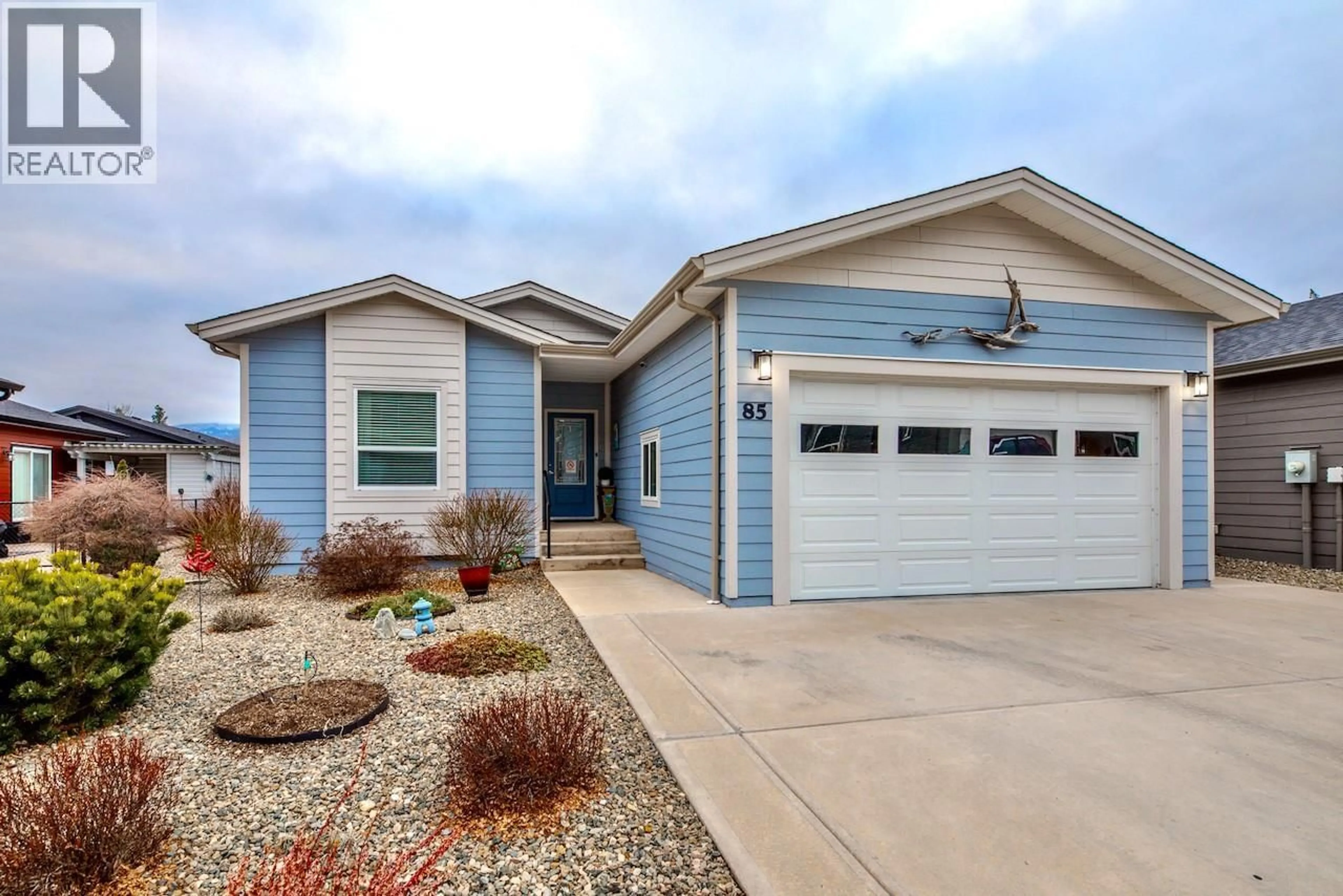 Home with vinyl exterior material, street for 85 - 8300 GALLAGHER LAKE FRONTAGE ROAD, Oliver British Columbia V0H1T2