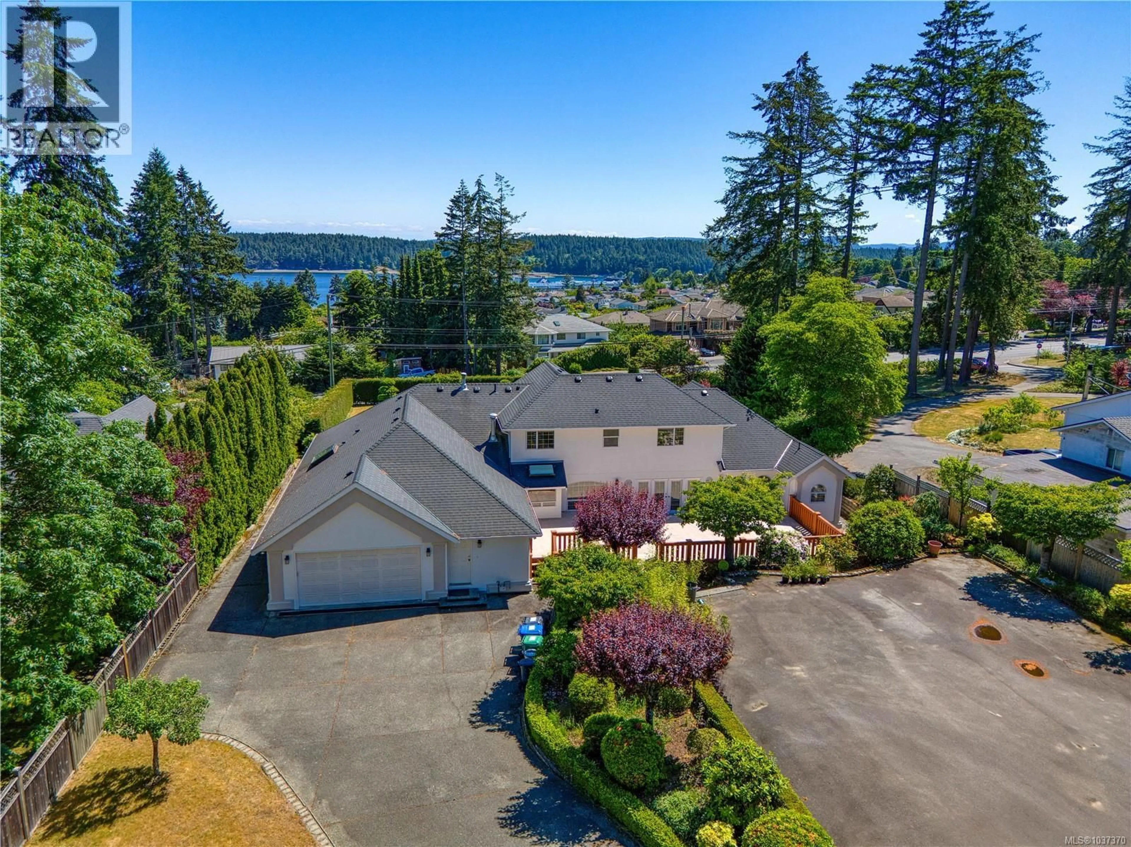 A pic from outside/outdoor area/front of a property/back of a property/a pic from drone, water/lake/river/ocean view for 2415 DEPARTURE BAY ROAD, Nanaimo British Columbia V9S3W1