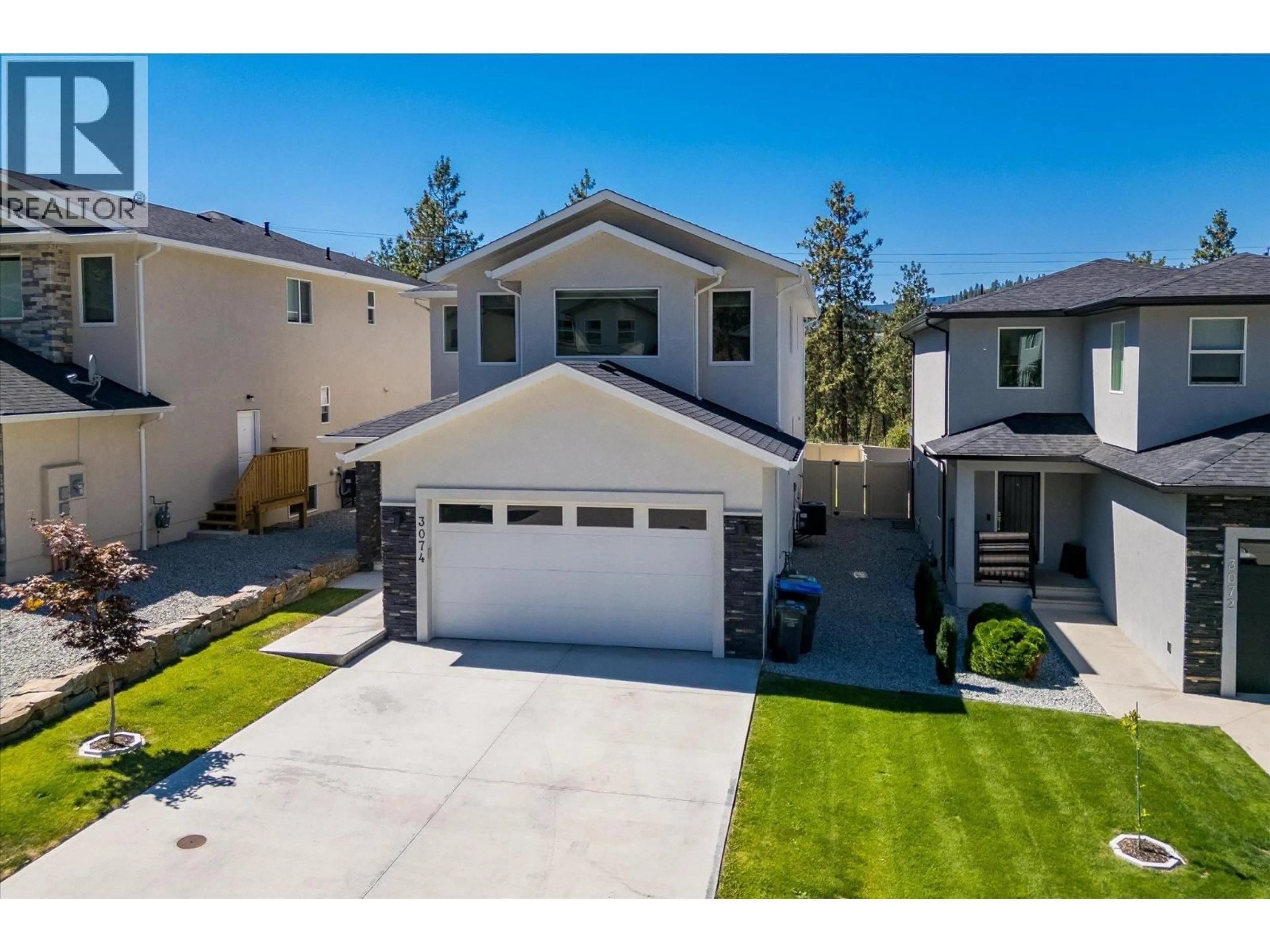 A pic from outside/outdoor area/front of a property/back of a property/a pic from drone, street for 3074 RIESLING WAY, West Kelowna British Columbia V4T0A5