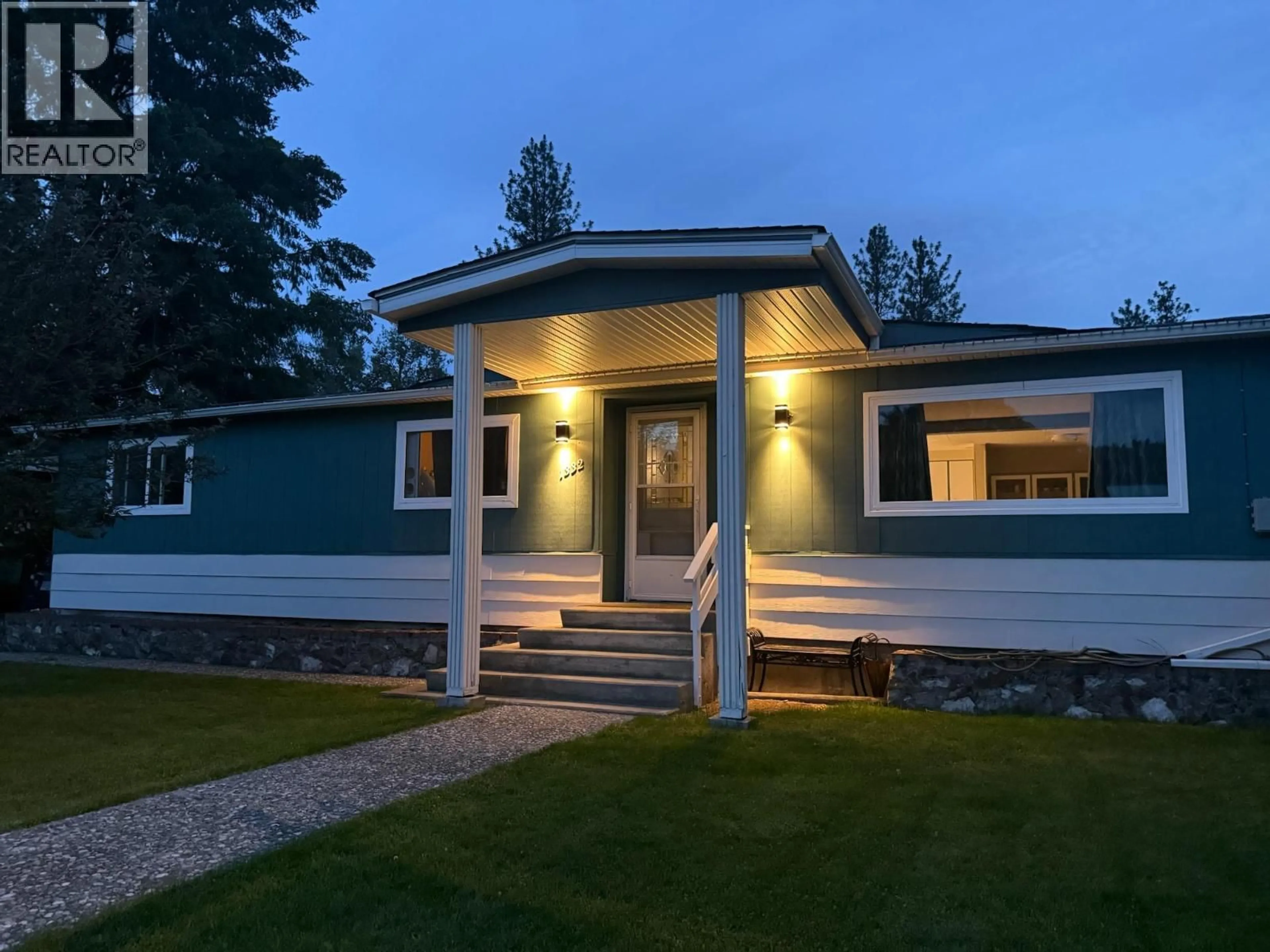 Home with vinyl exterior material, street for 1332 66TH STREET, Grand Forks British Columbia V0H1H0