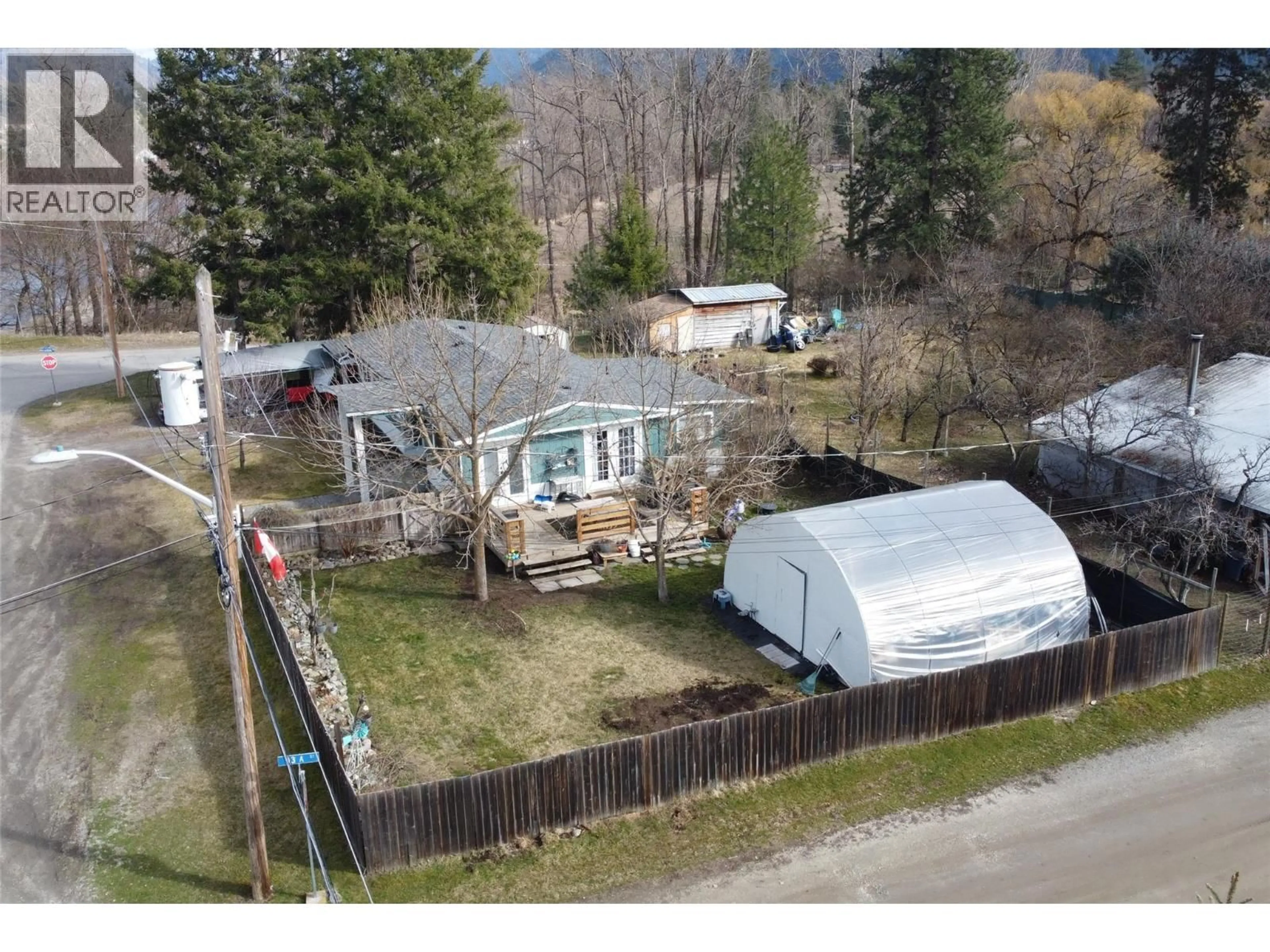 A pic from outside/outdoor area/front of a property/back of a property/a pic from drone, unknown for 1332 66TH STREET, Grand Forks British Columbia V0H1H0