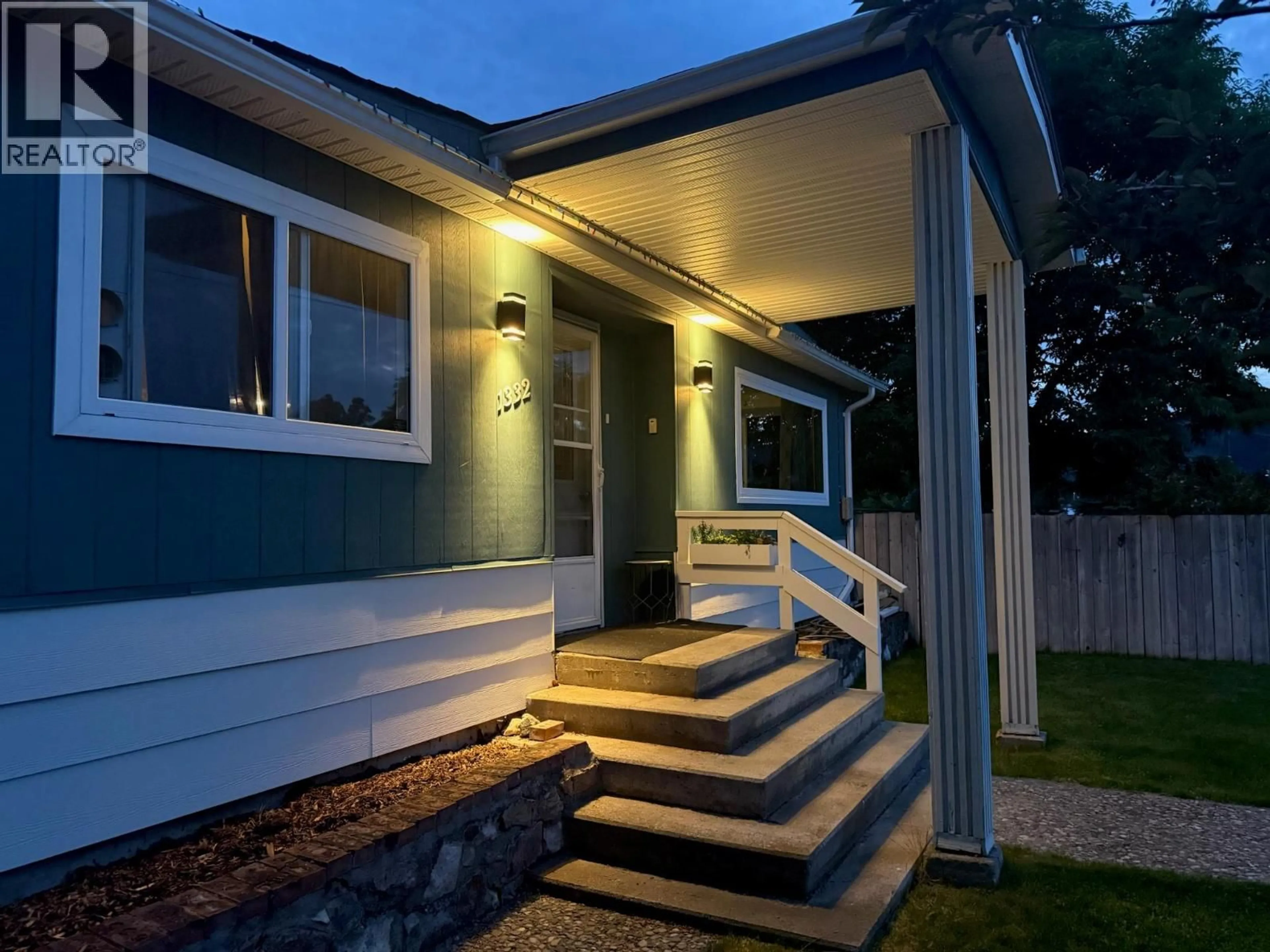Home with vinyl exterior material, street for 1332 66TH STREET, Grand Forks British Columbia V0H1H0