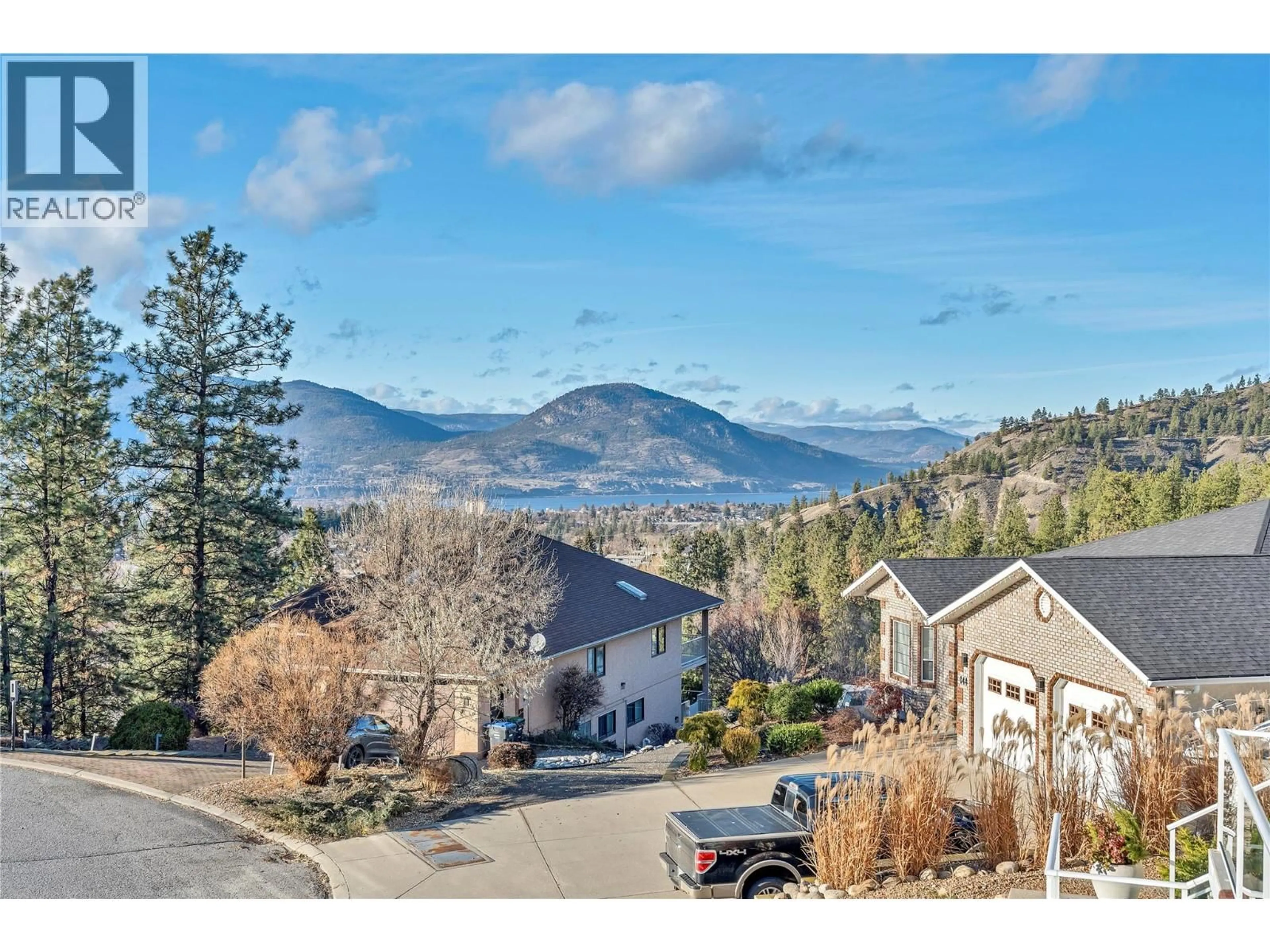 A pic from outside/outdoor area/front of a property/back of a property/a pic from drone, mountain view for 130 WILLIAMSON PLACE, Penticton British Columbia V2A8N1