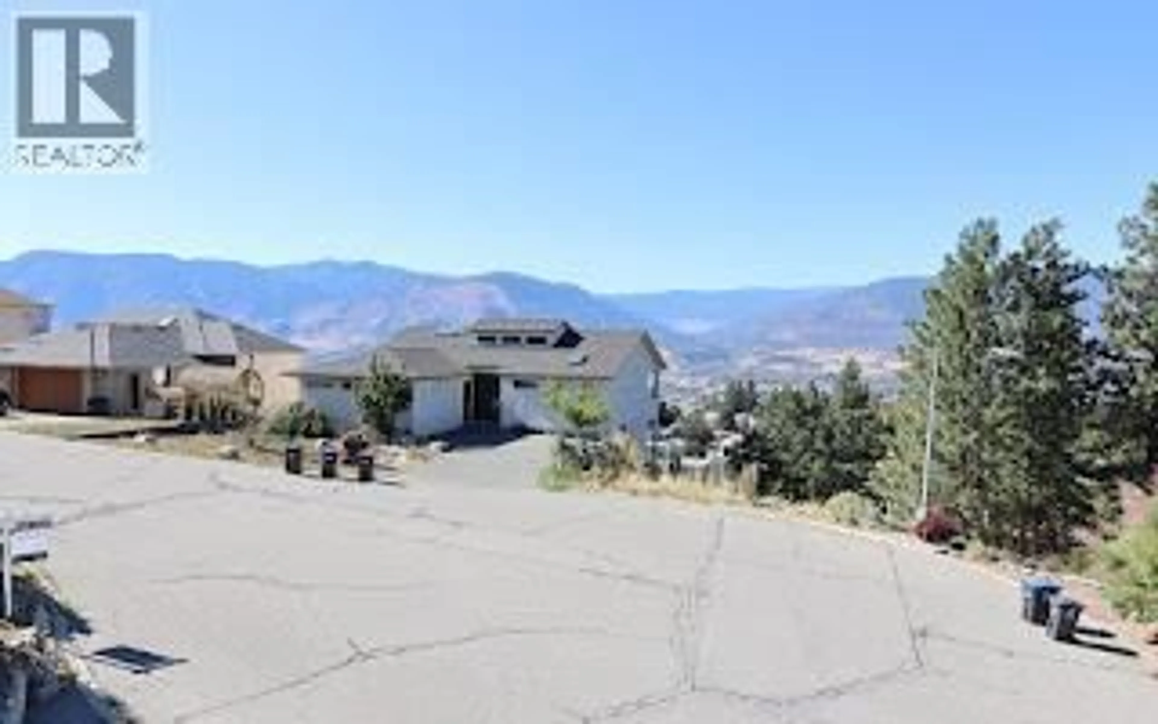 A pic from outside/outdoor area/front of a property/back of a property/a pic from drone, mountain view for 130 WILLIAMSON PLACE, Penticton British Columbia V2A8N1